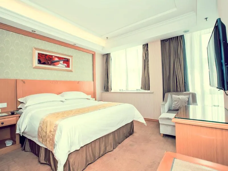 Bed in Vienna Hotel Rugao Zhengxiang Square