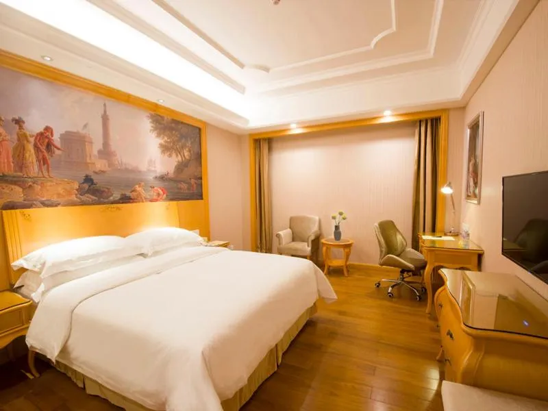 Bed in Vienna International Hotel Shenzhen Guangming Avenue