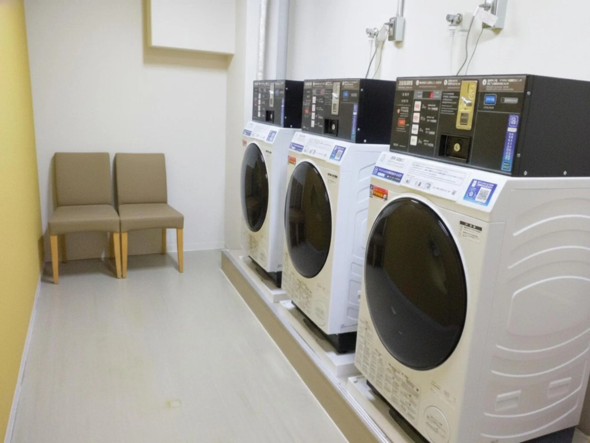 washing machine in Sakura Garden Hotel
