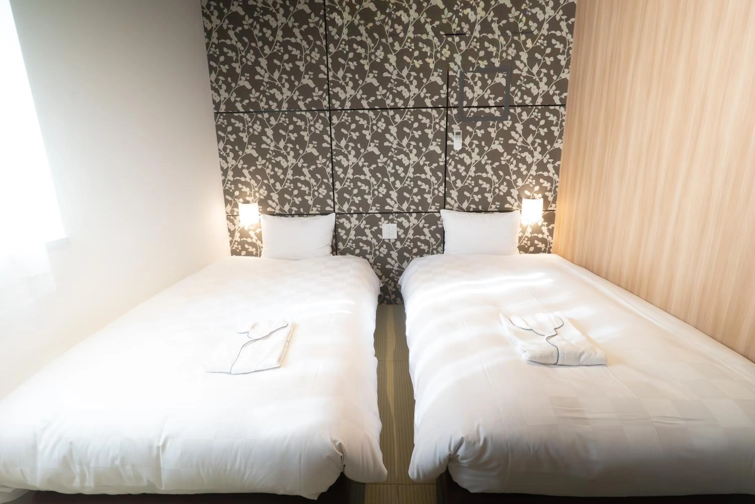 Bed in Sakura Garden Hotel