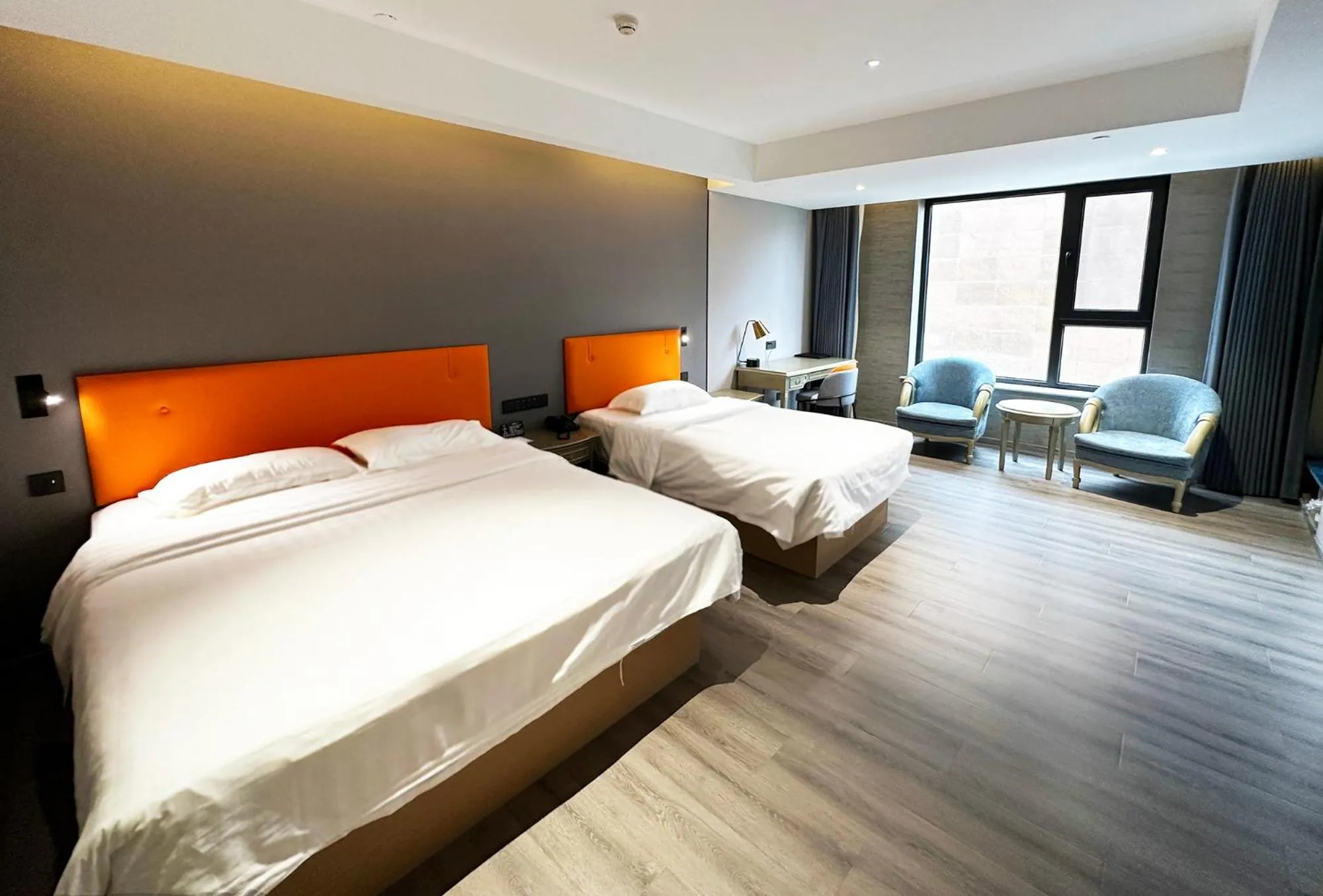 Bed in National Jade Hotel