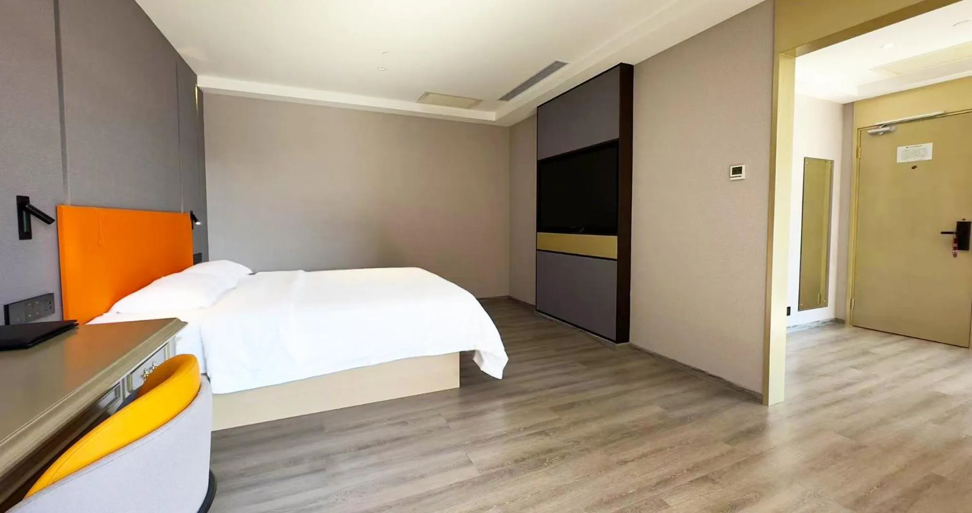 Bed in National Jade Hotel