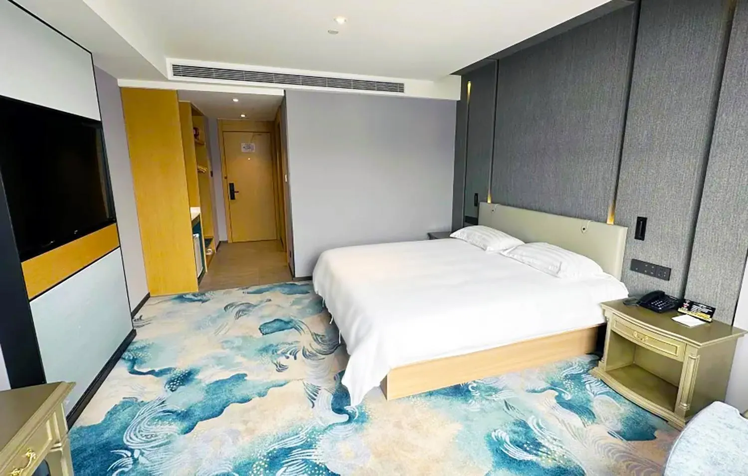 Bed in National Jade Hotel