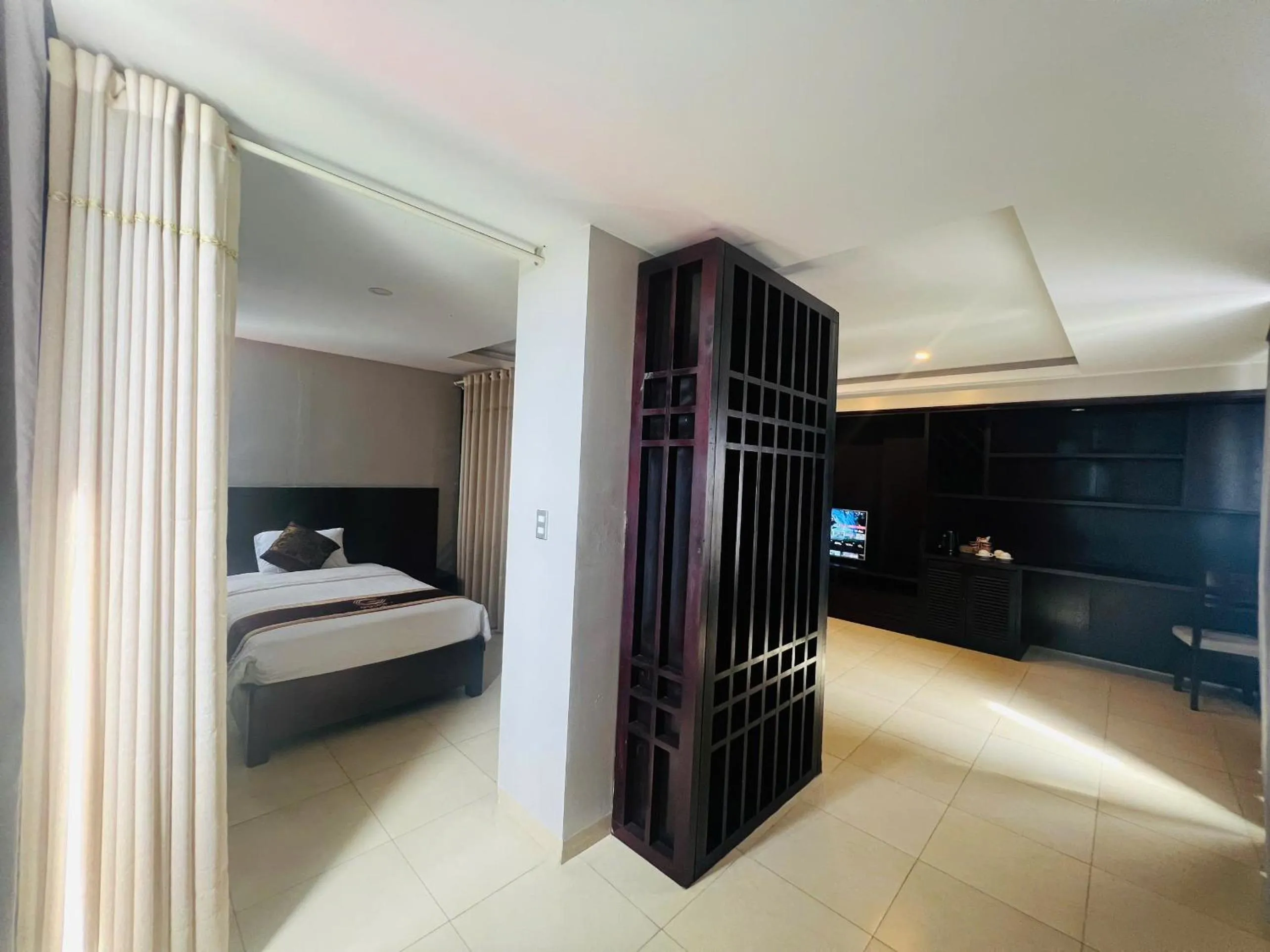 Bed in Golden Quang Tri Hotel