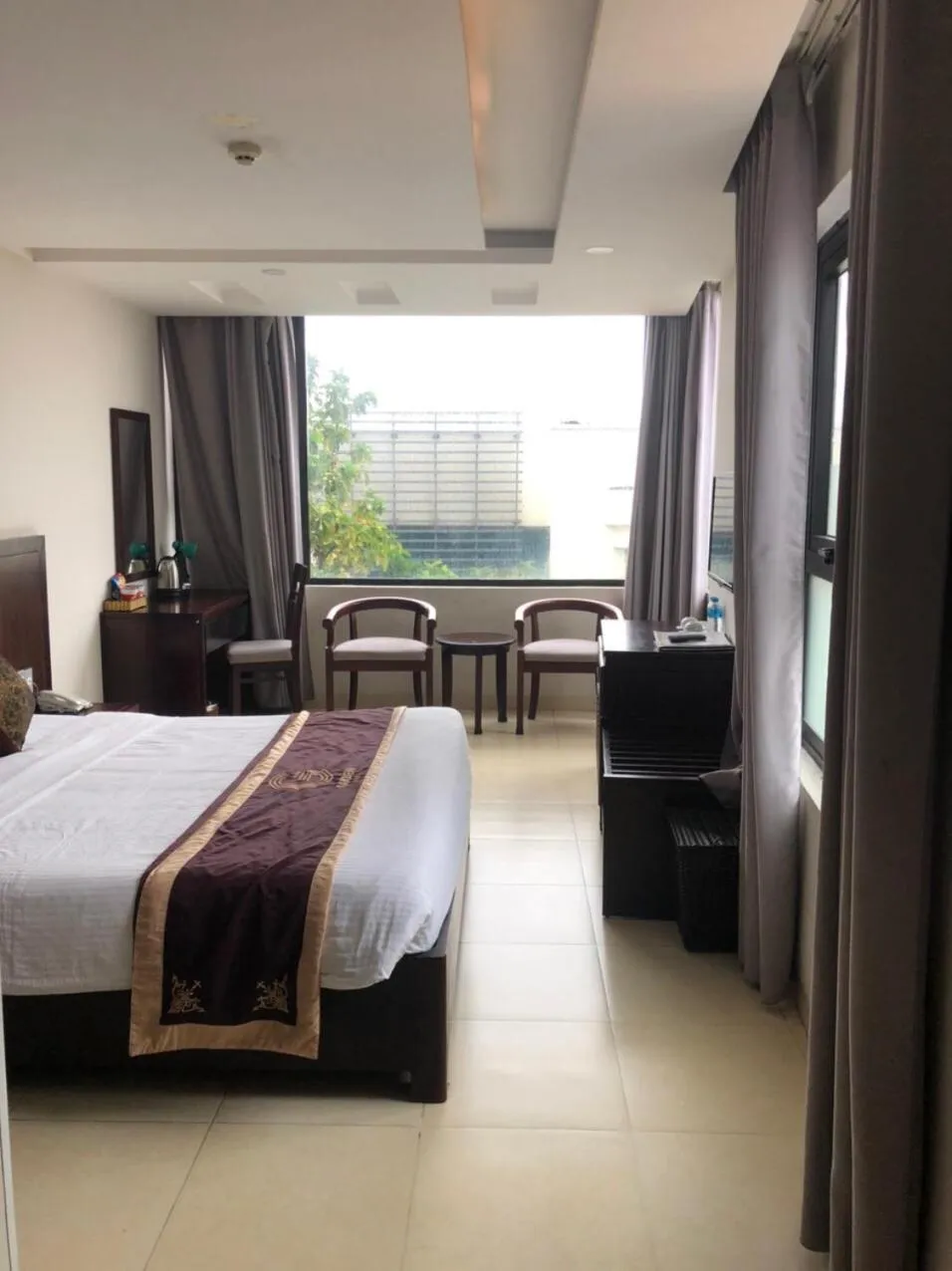 Bed in Golden Quang Tri Hotel