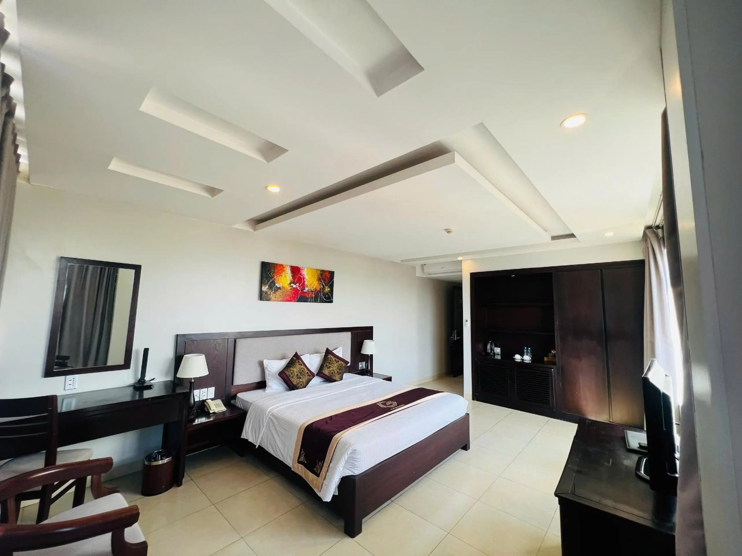 Bed in Golden Quang Tri Hotel