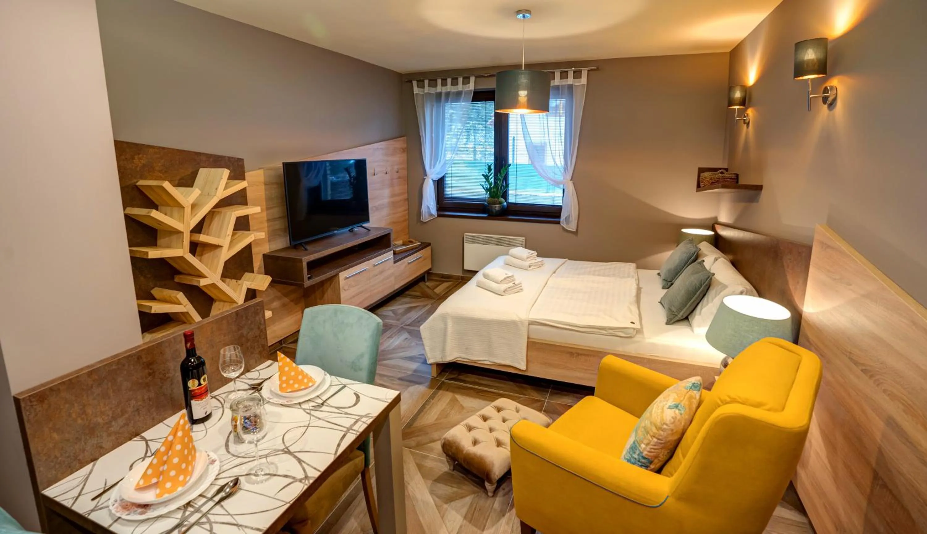 Communal lounge/ TV room, Bed in Apartmány Tri Studničky