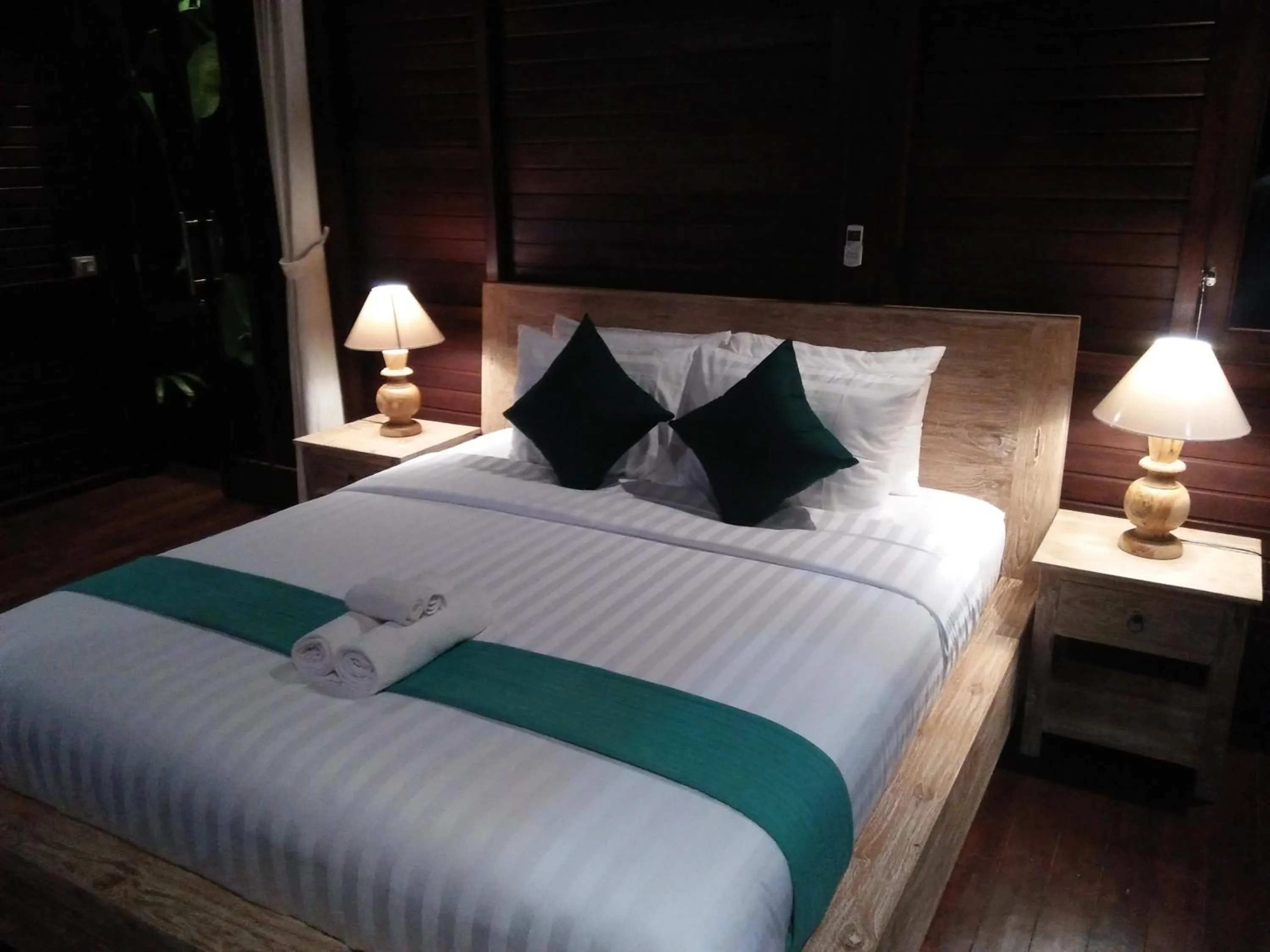 Bed in Villa Wedang