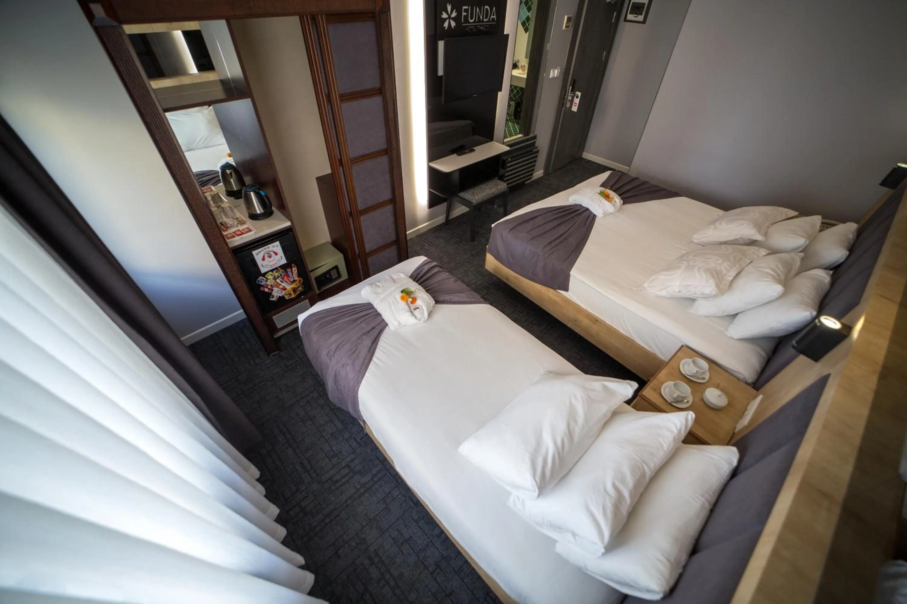 Bedroom, Bed in Funda Hotel