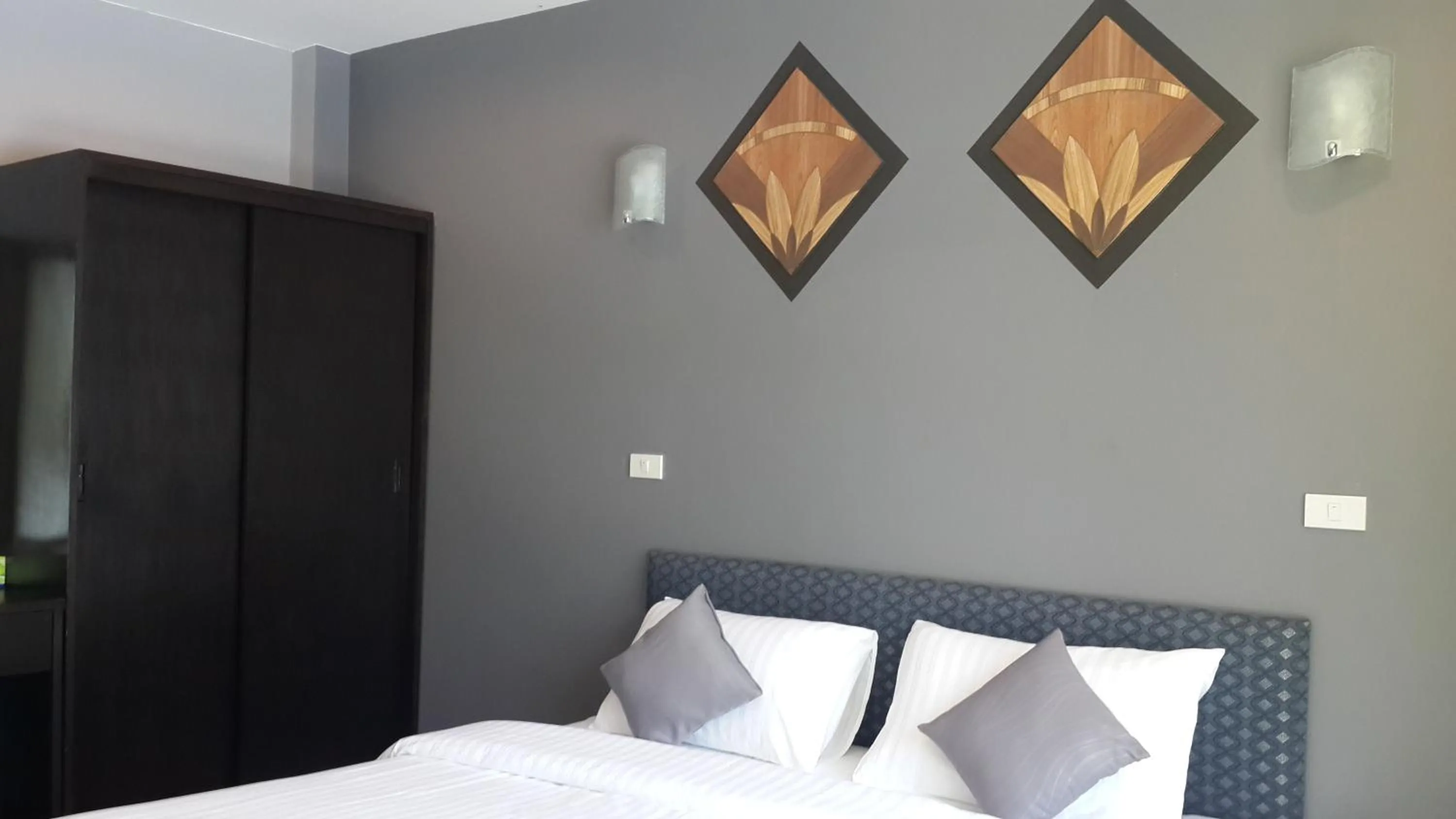 Bed in MJ Boutique Hotel Khao Lak