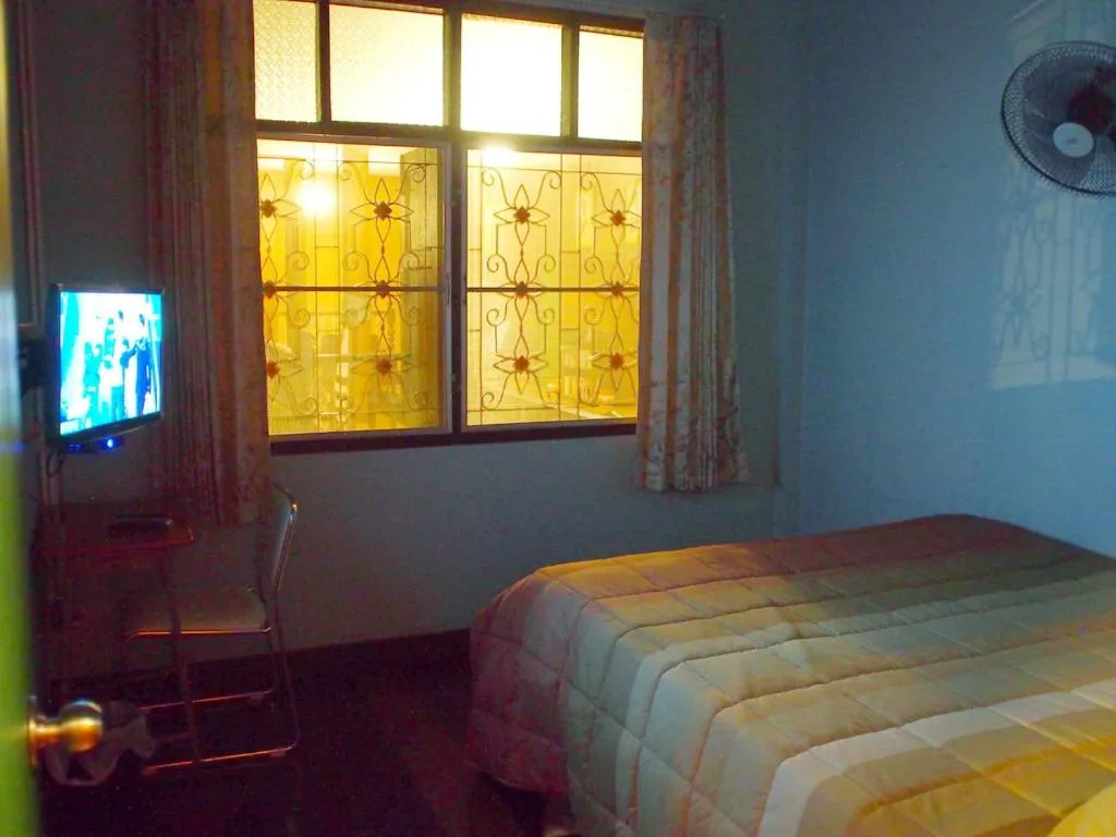 Bed in Chommuang Guest House