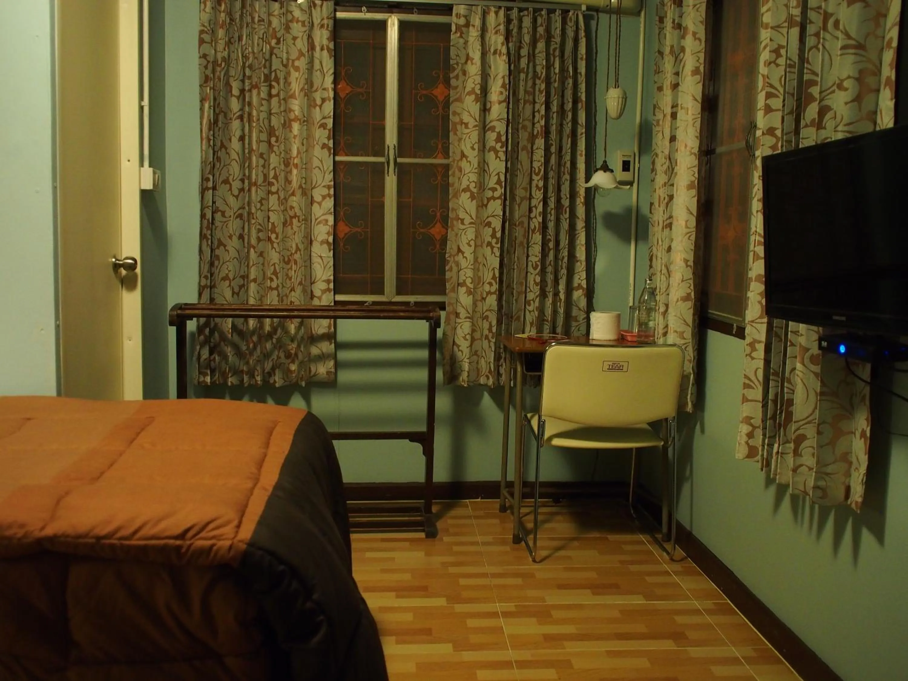 Bed in Chommuang Guest House