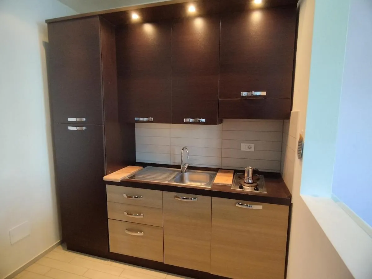 Kitchen or kitchenette in Cala Dei Mori