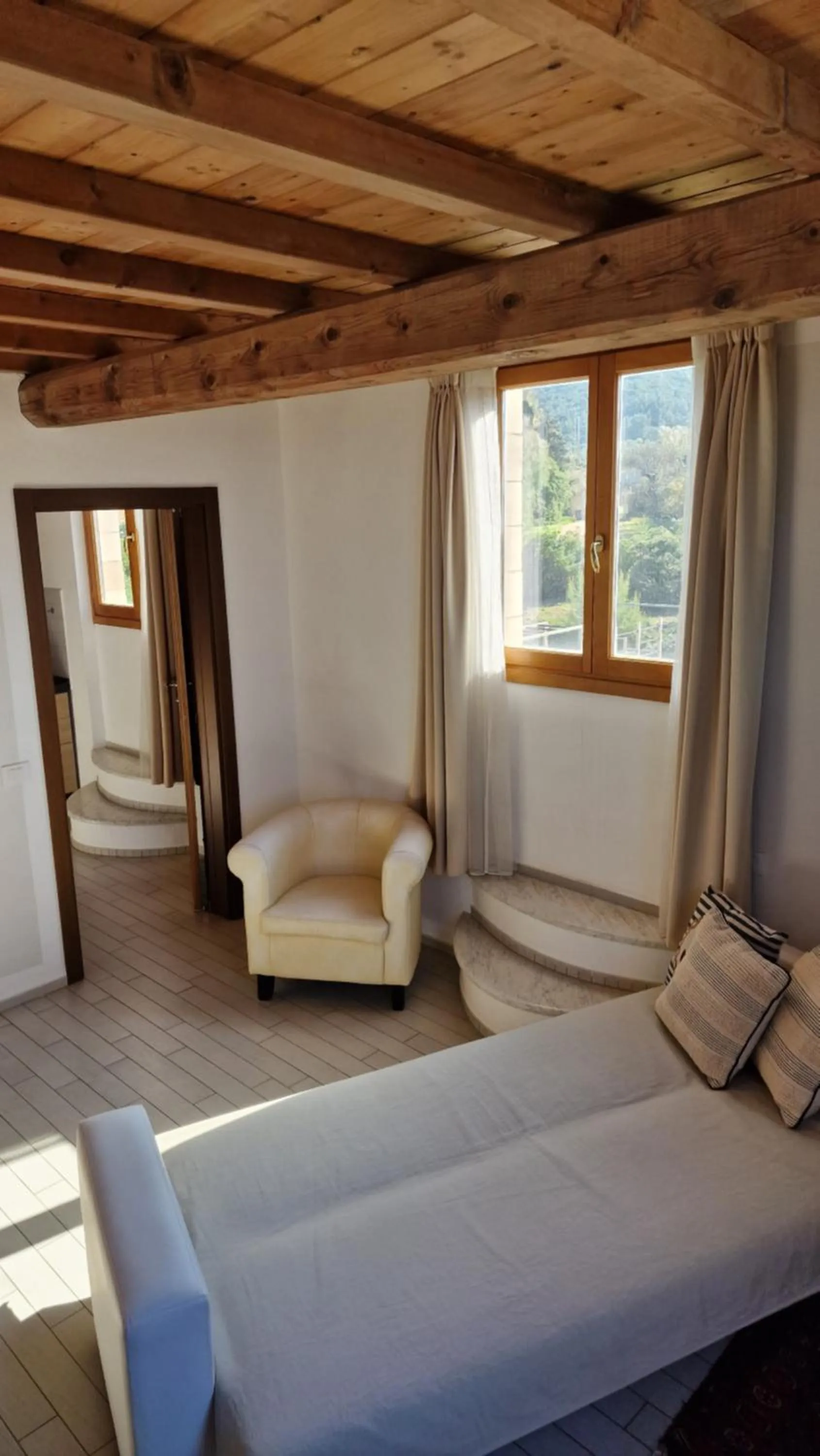 Seating area, Bed in Cala Dei Mori