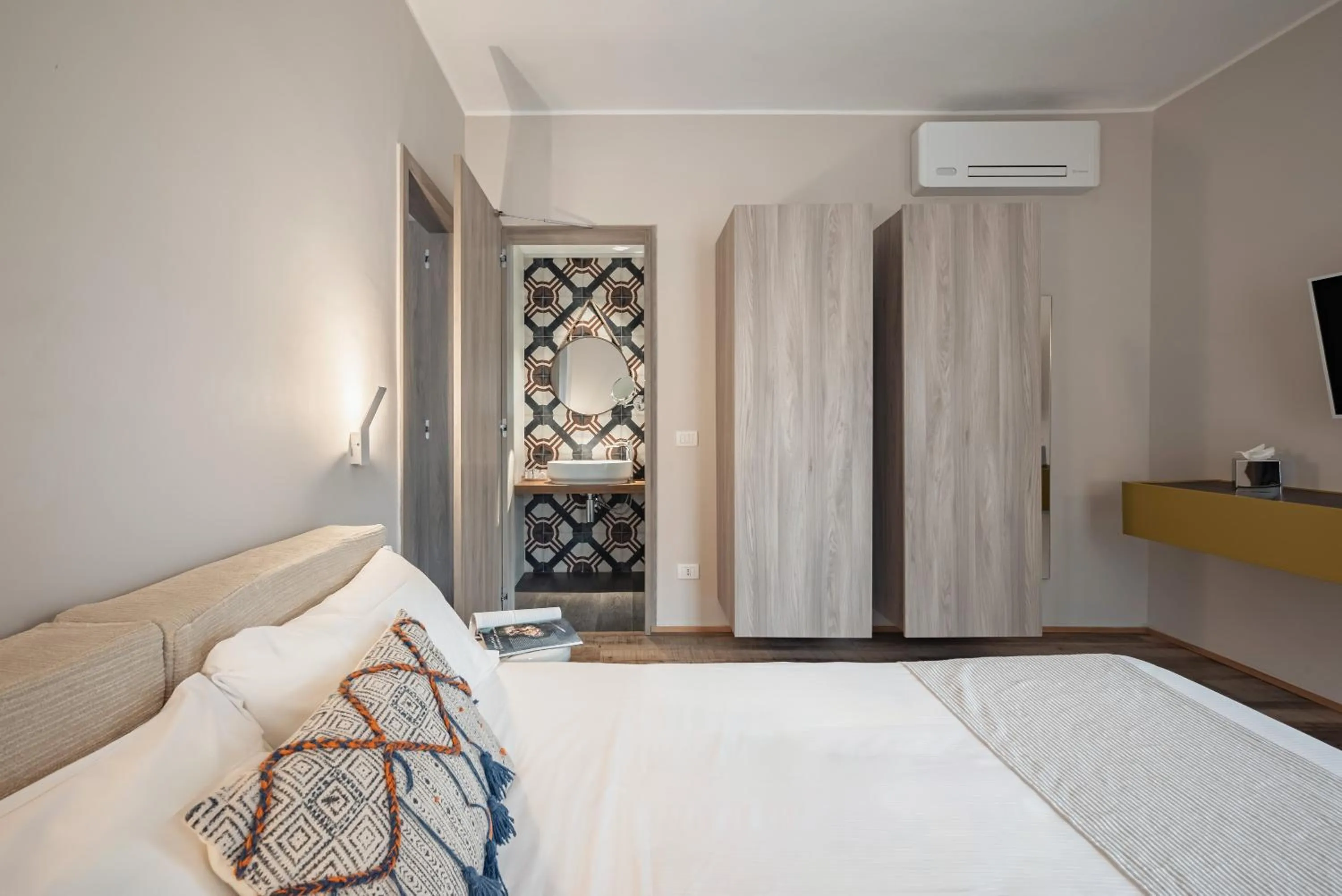 Bed in Marina Garden Hotel