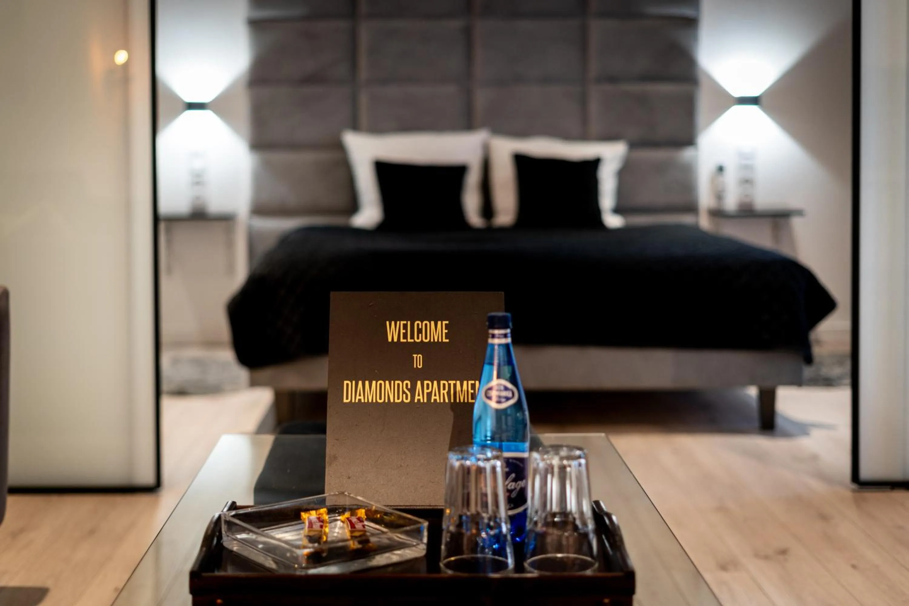 Seating area, Bed in Diamonds Apartment