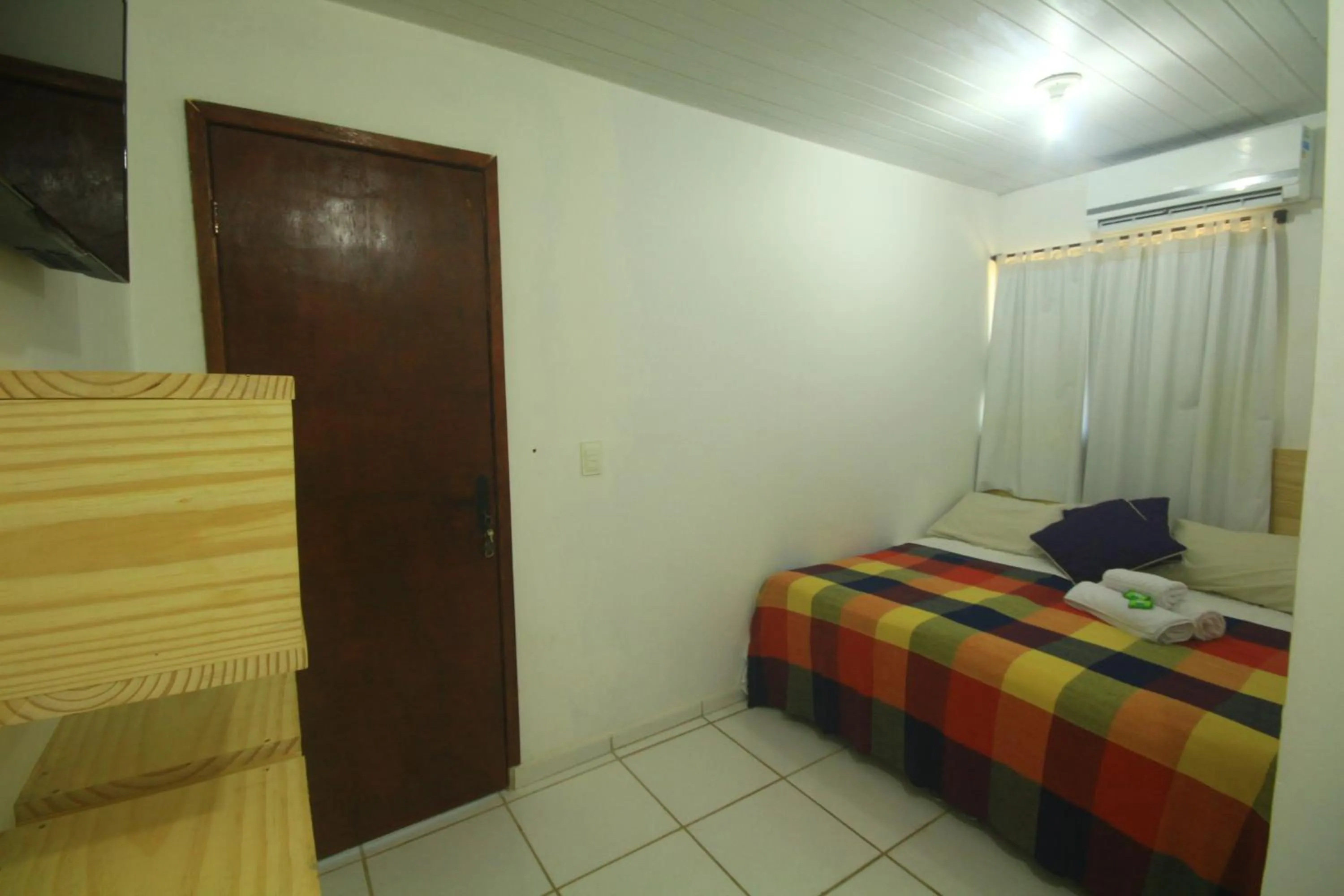 Bed in Pousada Guedes Noronha