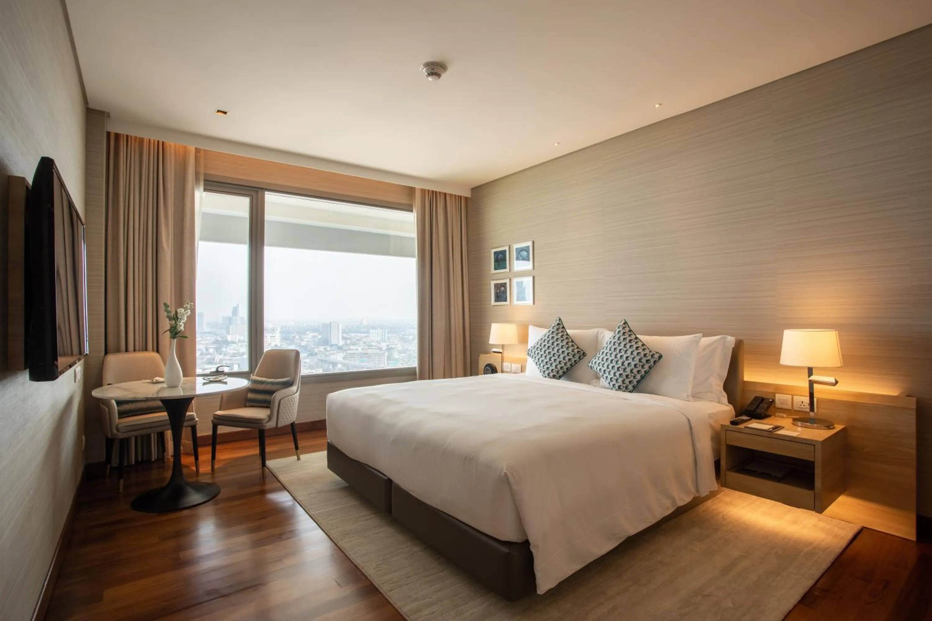 Bed in Avani Plus Riverside Bangkok Hotel