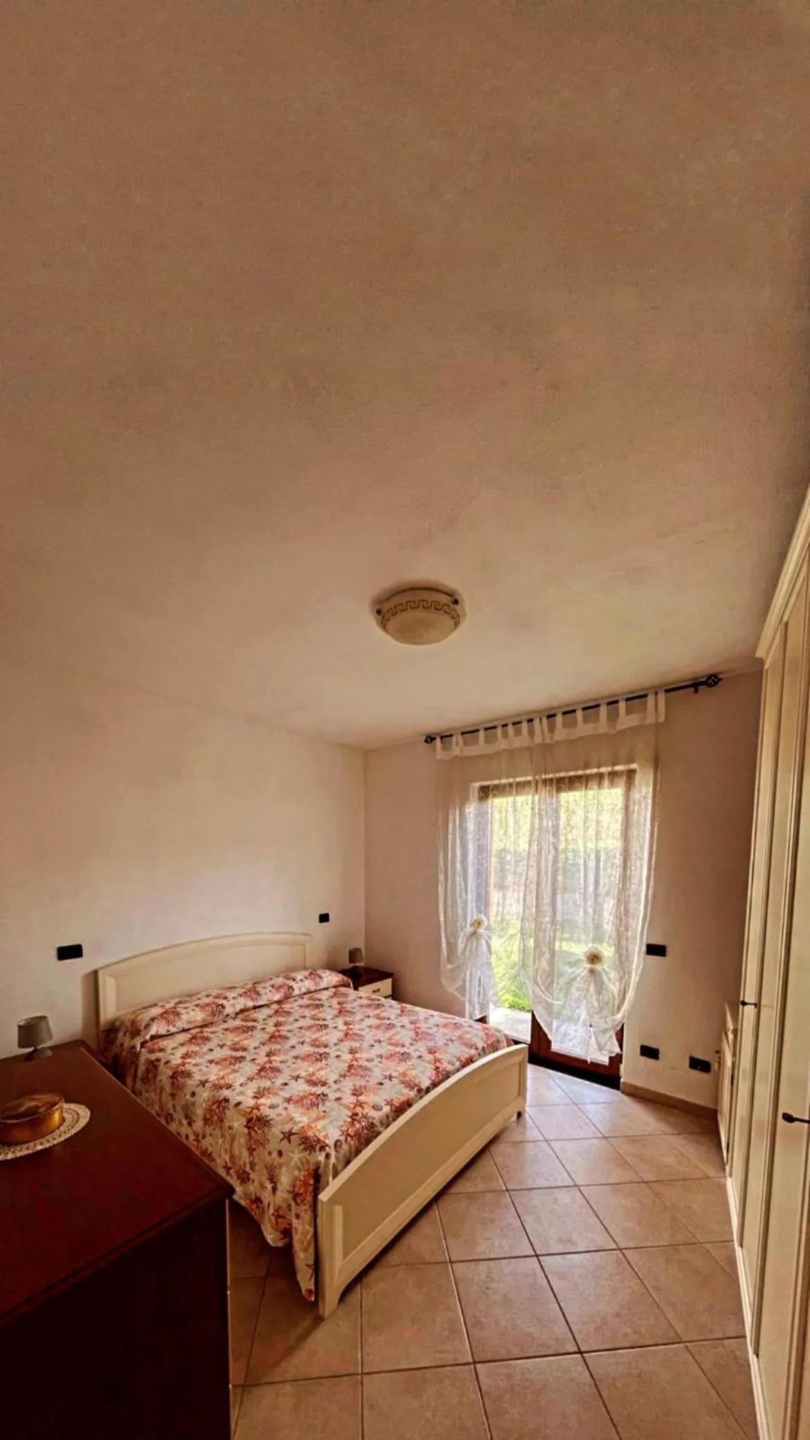 Bedroom in Case Vacanze Le Buganville