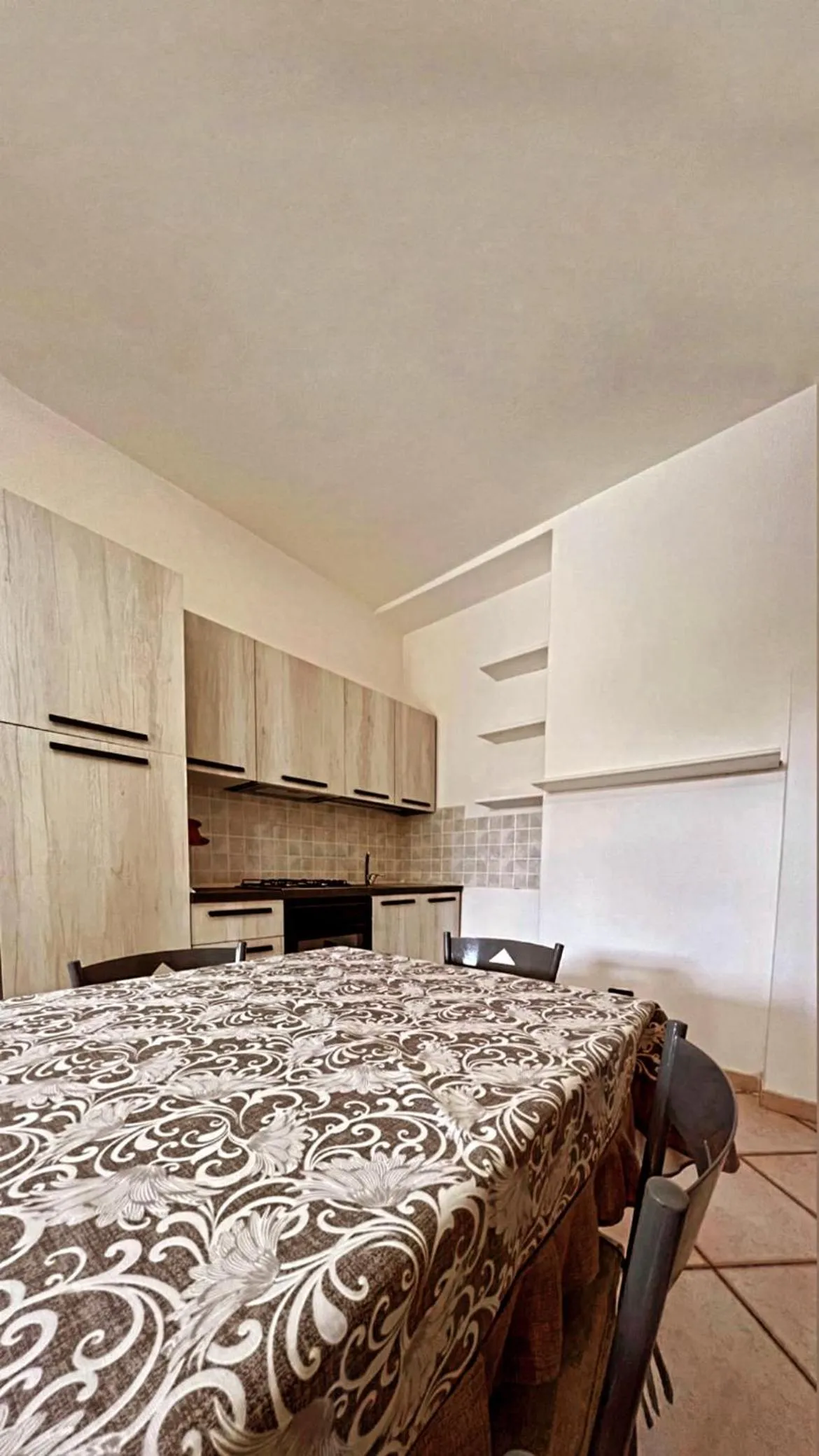 Kitchen or kitchenette in Case Vacanze Le Buganville