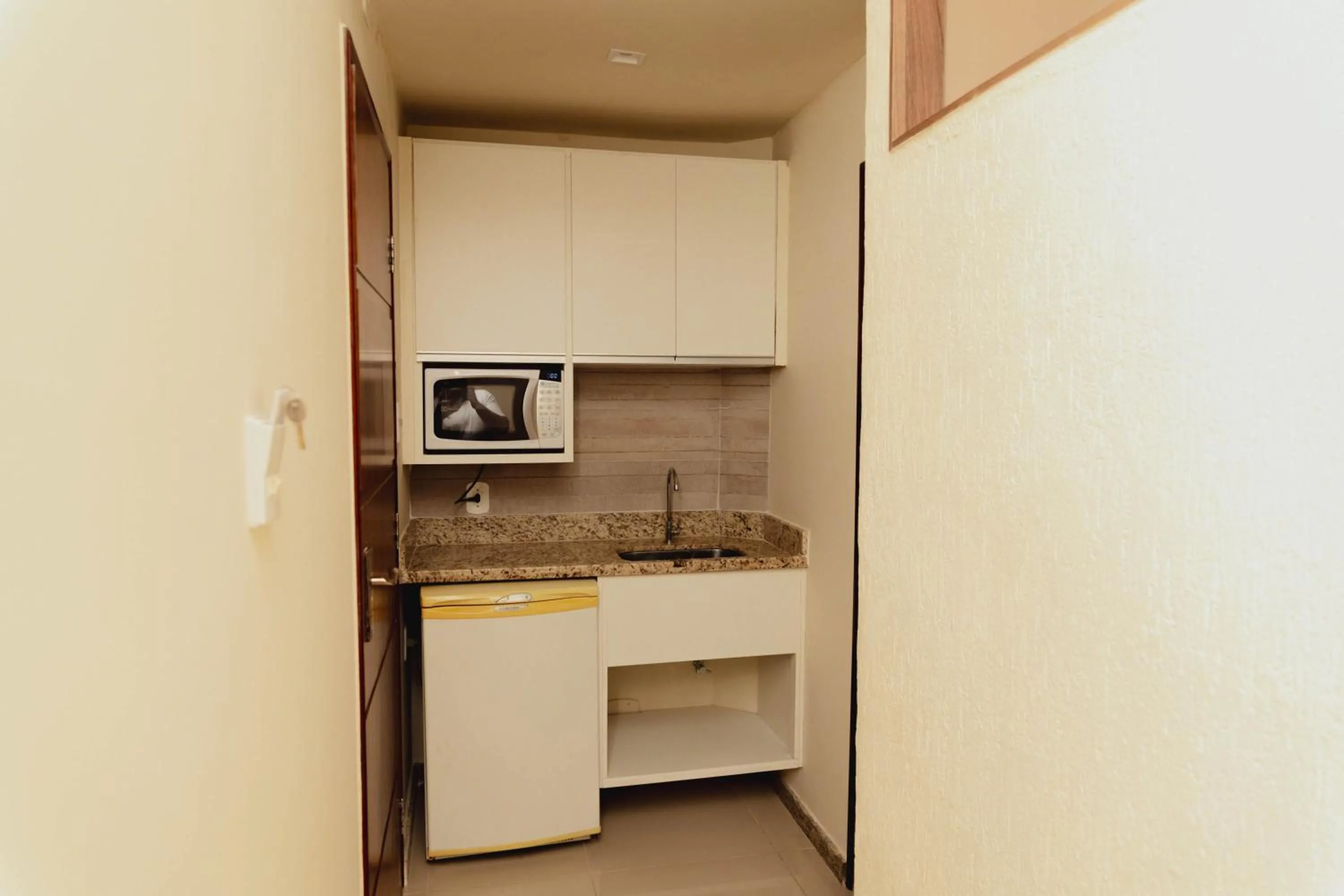 Kitchen or kitchenette in San Diego Lancaster Teófilo Otoni