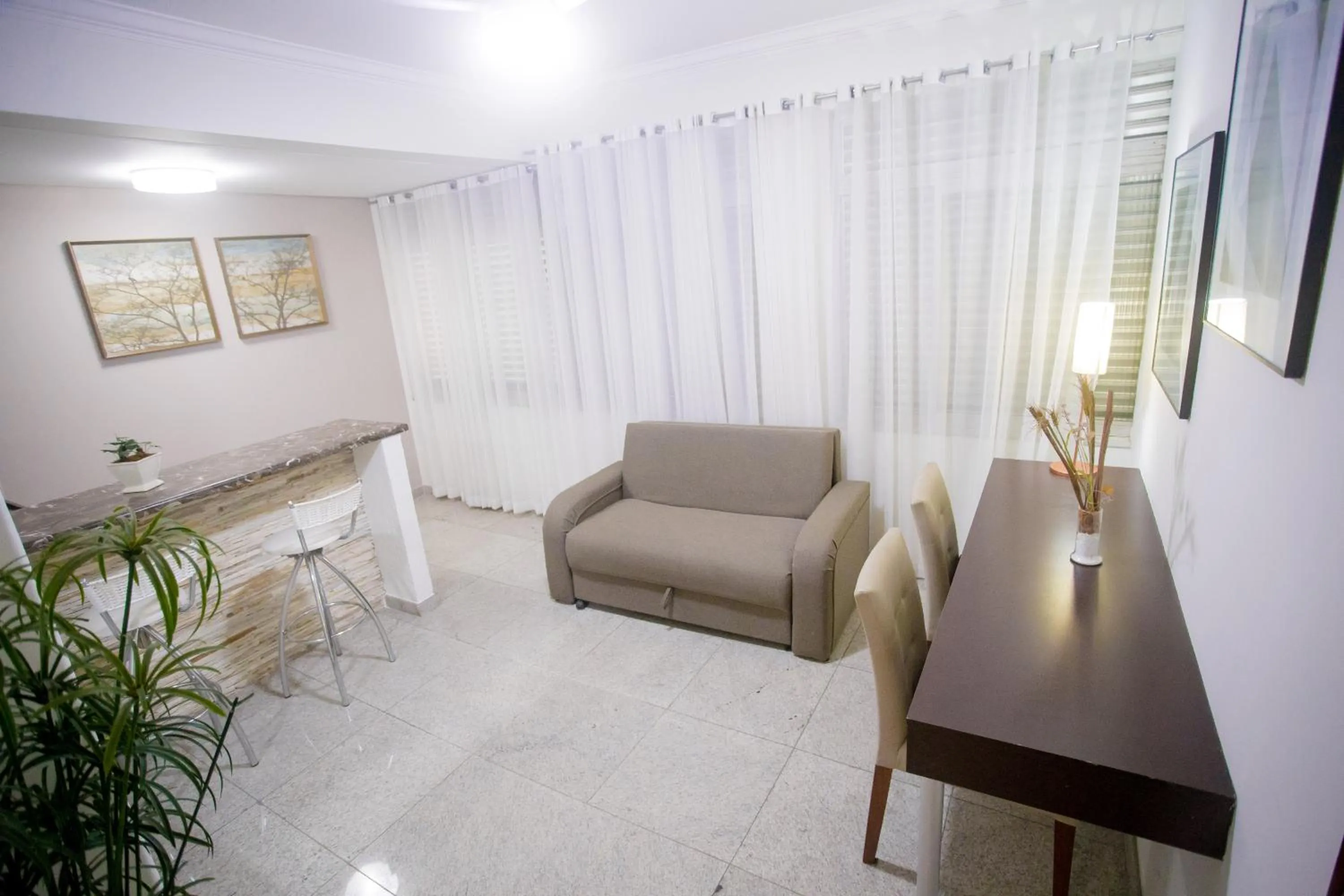 Seating area in San Diego Lancaster Teófilo Otoni