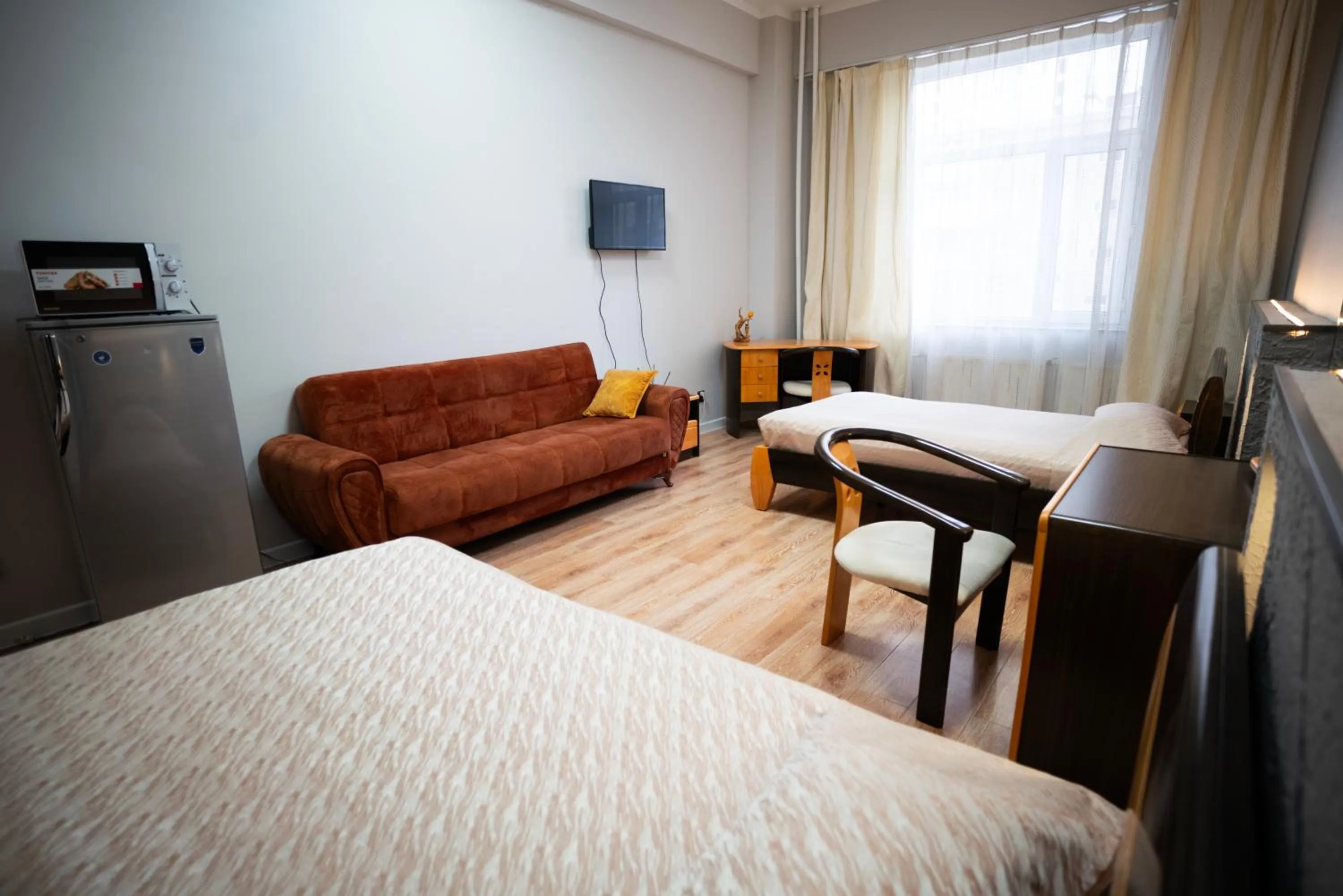 Bed in Tsolmon's Serviced Apartments
