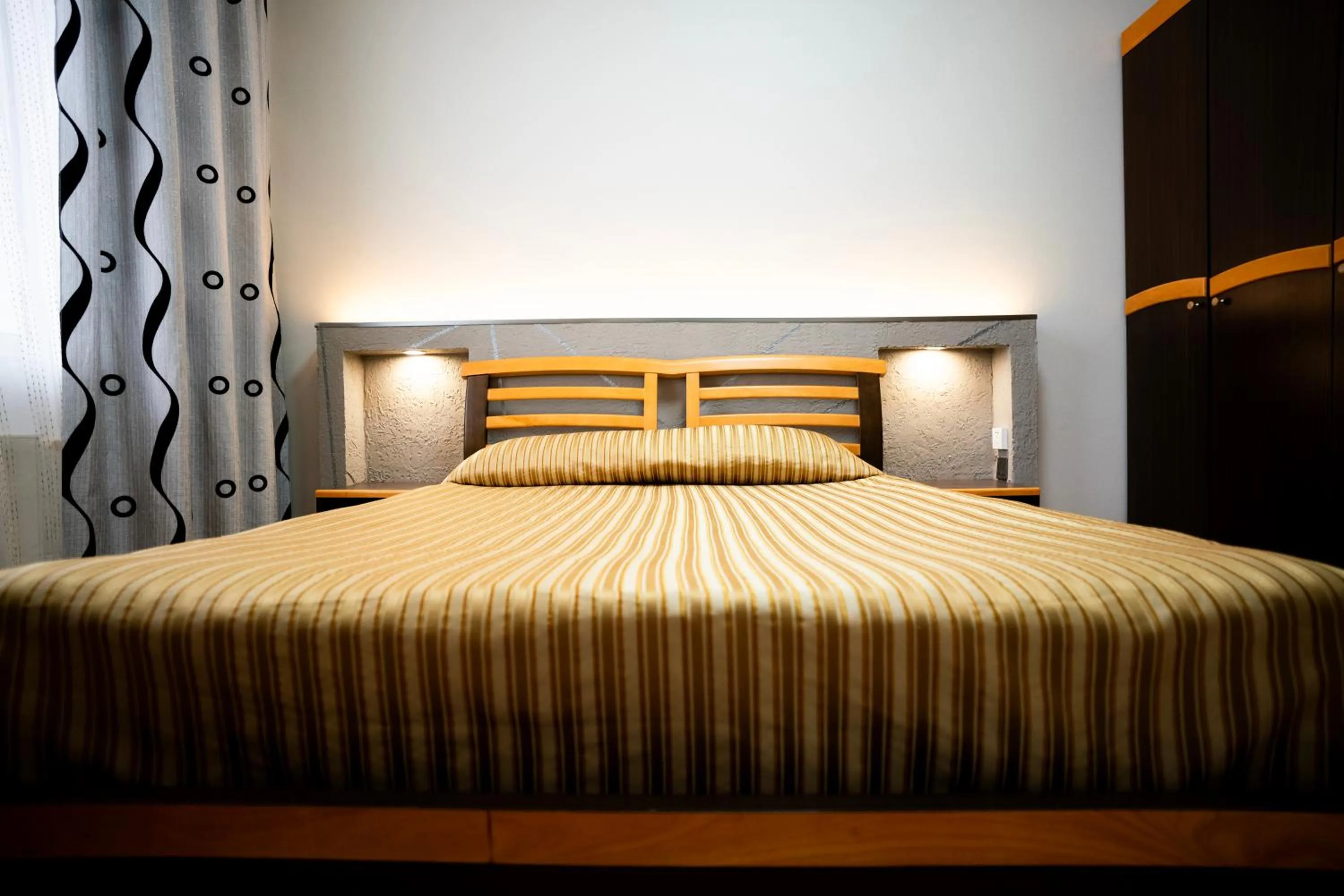 Bed in Tsolmon's Serviced Apartments
