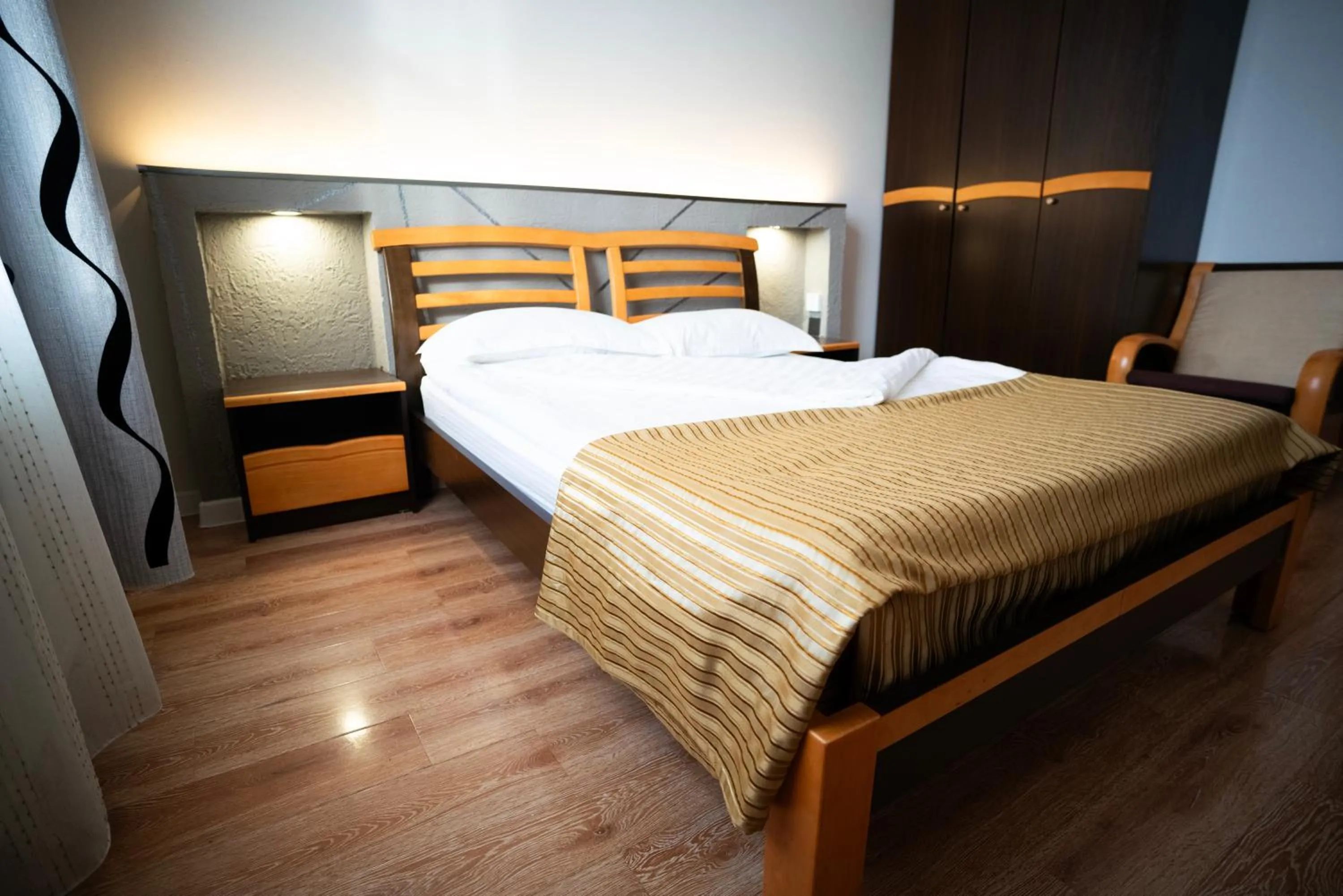 Bed in Tsolmon's Serviced Apartments