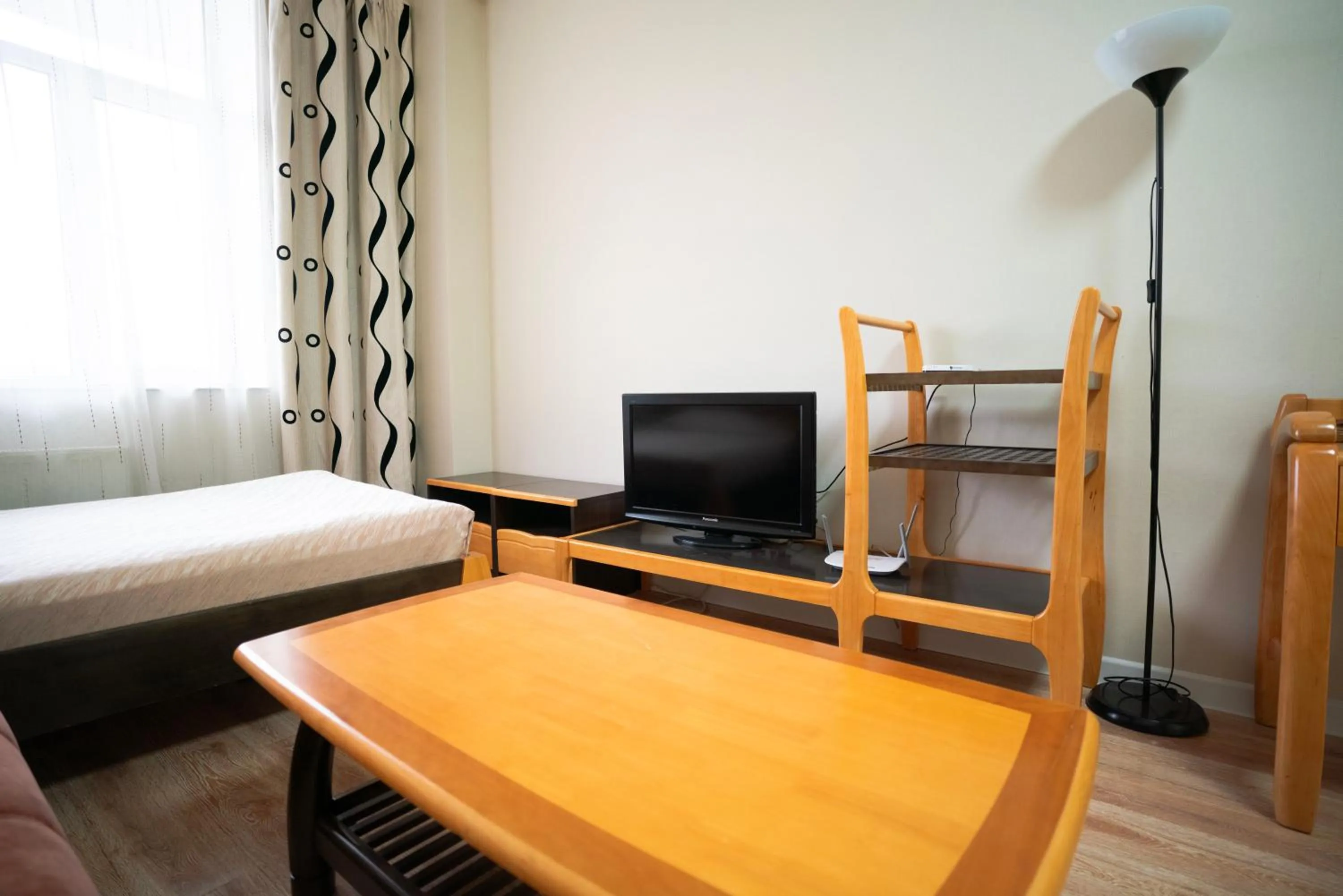 Bed in Tsolmon's Serviced Apartments