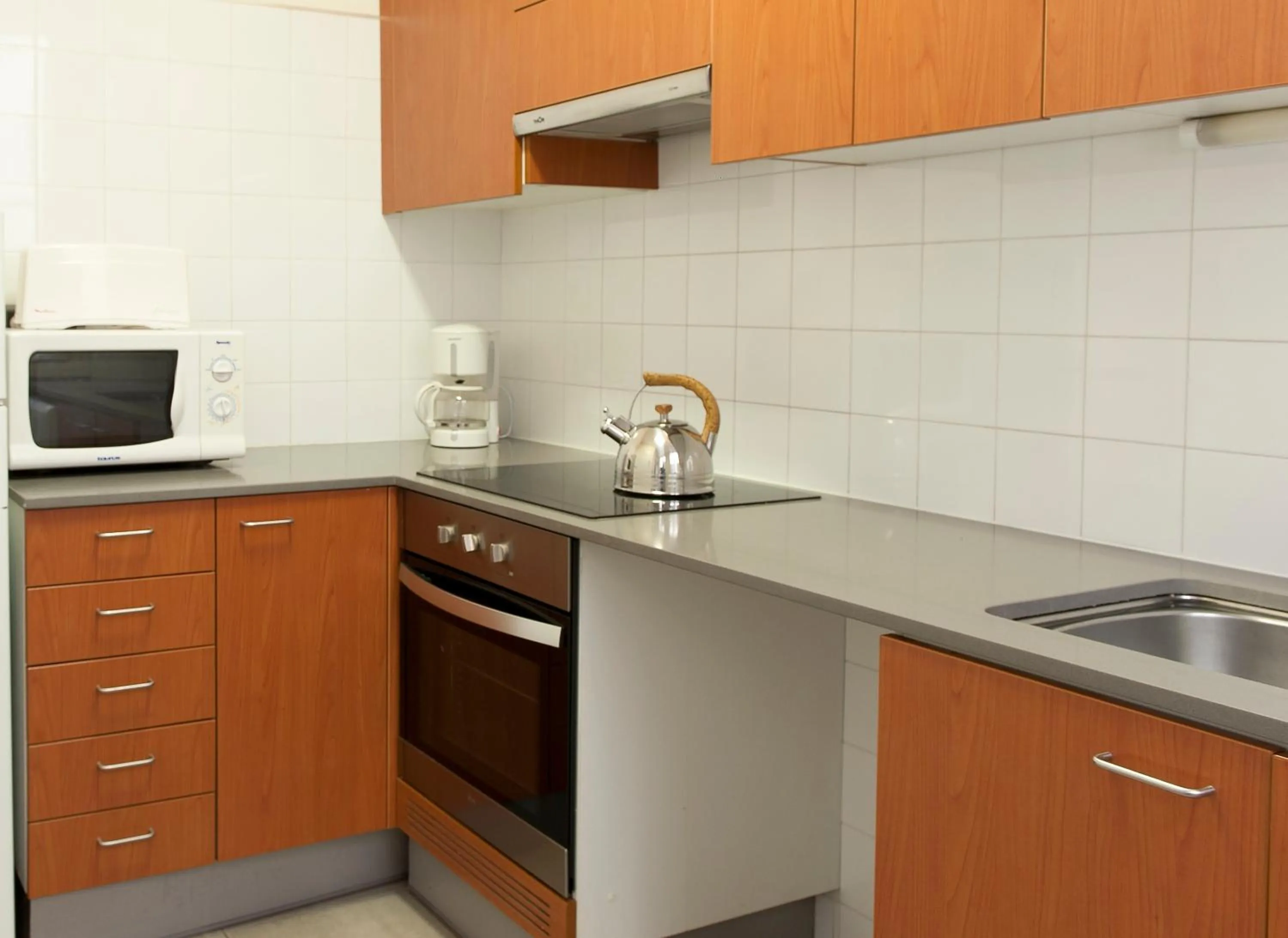 Kitchen or kitchenette in MH Apartments Tetuan
