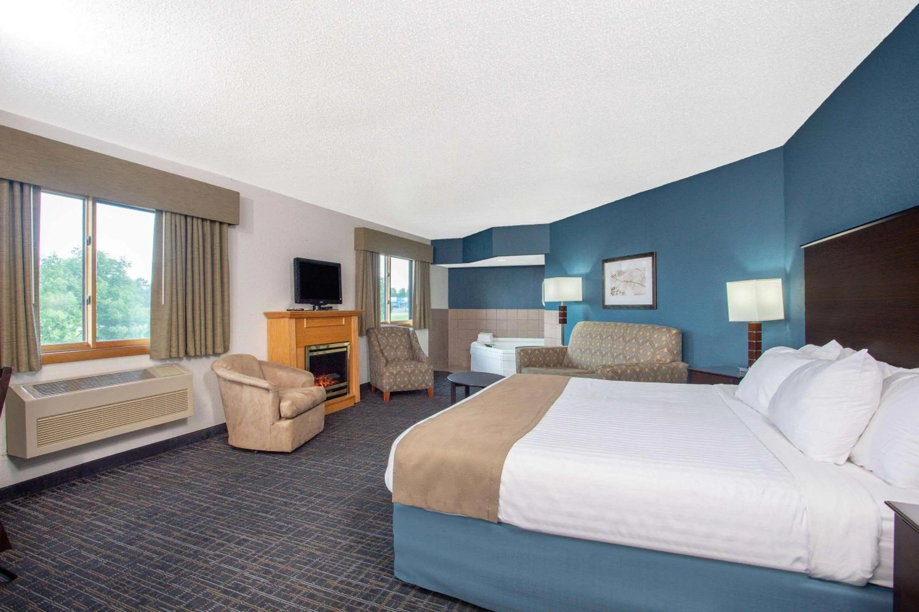 Photo of the whole room, Bed in AmericInn by Wyndham Hayward