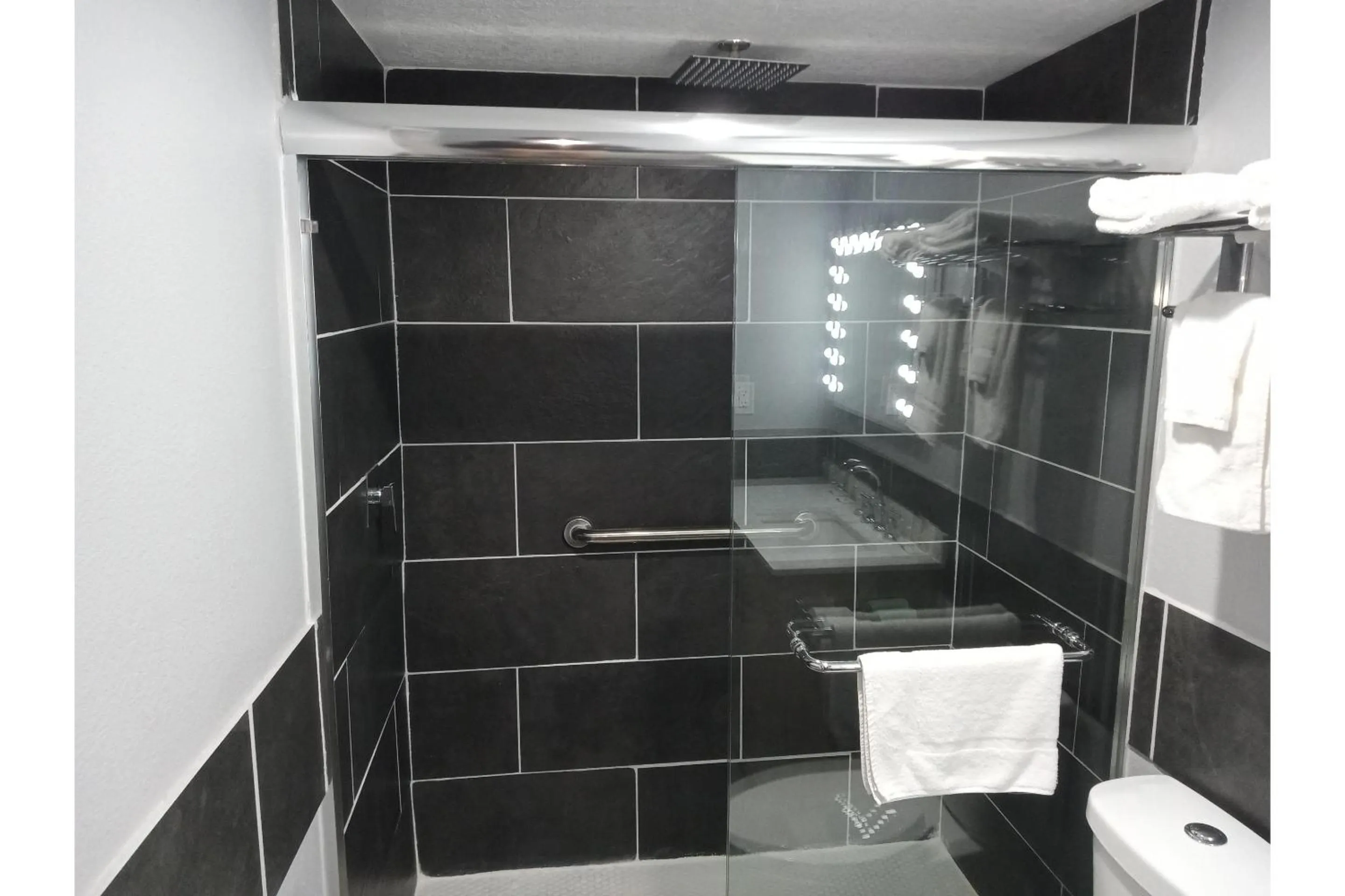 Bathroom in Marshall Lodge By OYO Hwy 65