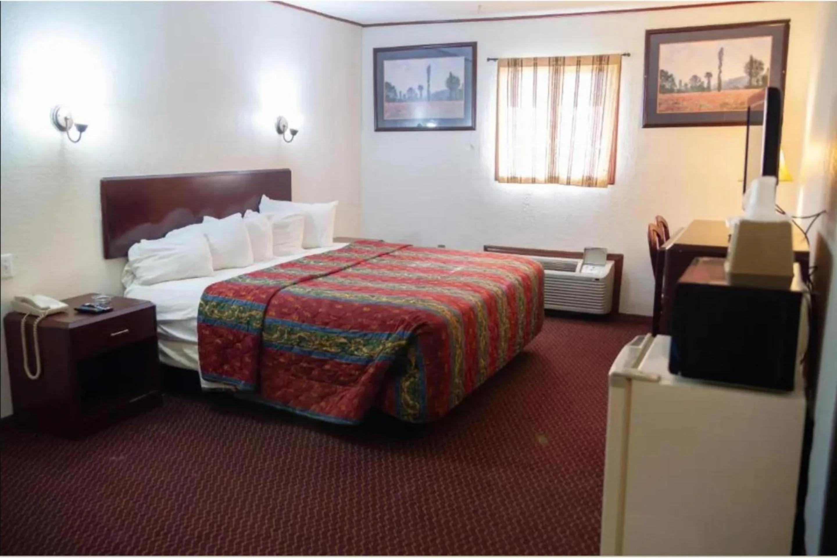 Bedroom, Bed in Marshall Lodge By OYO Hwy 65