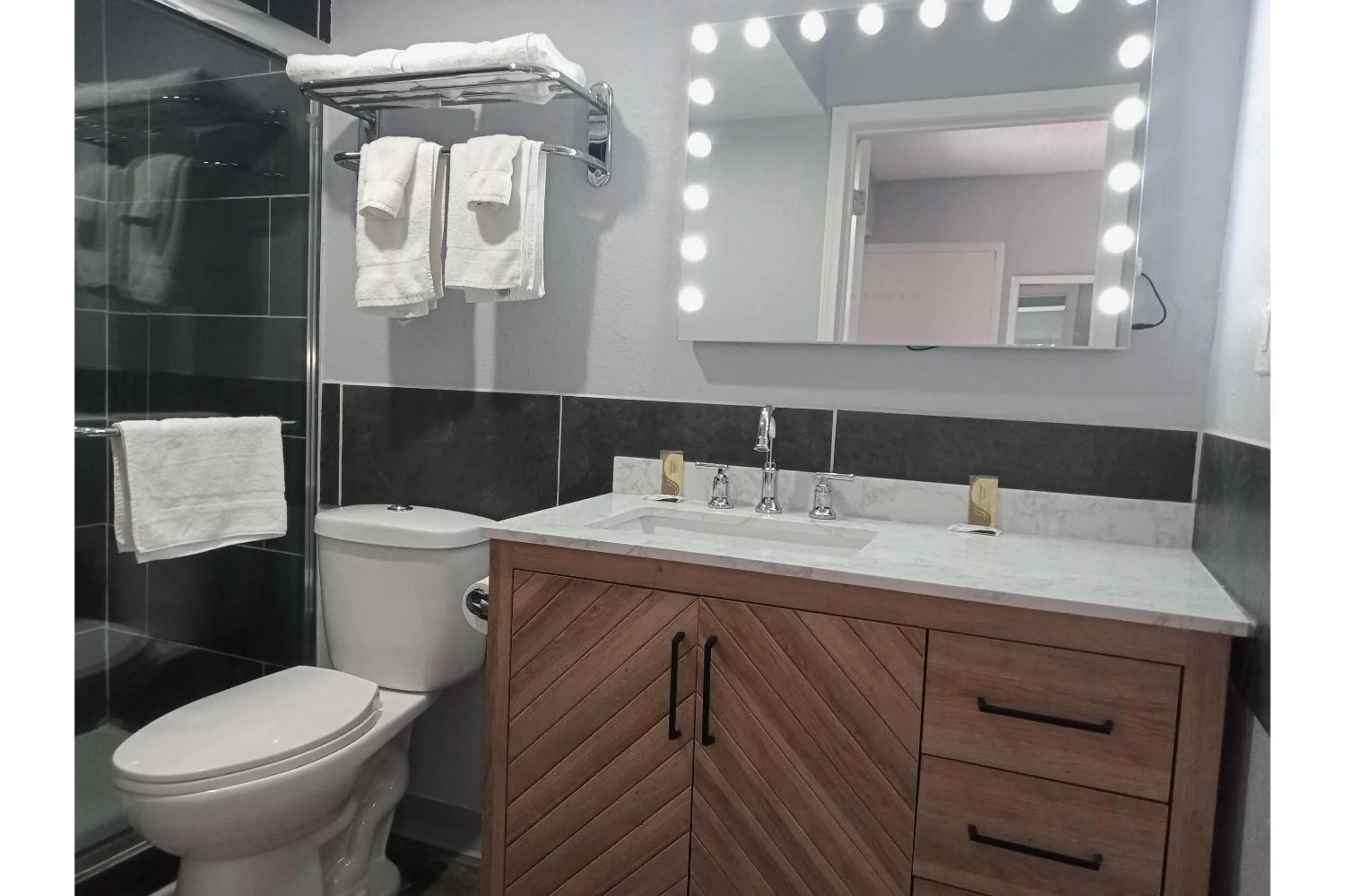 Bathroom in Marshall Lodge By OYO Hwy 65