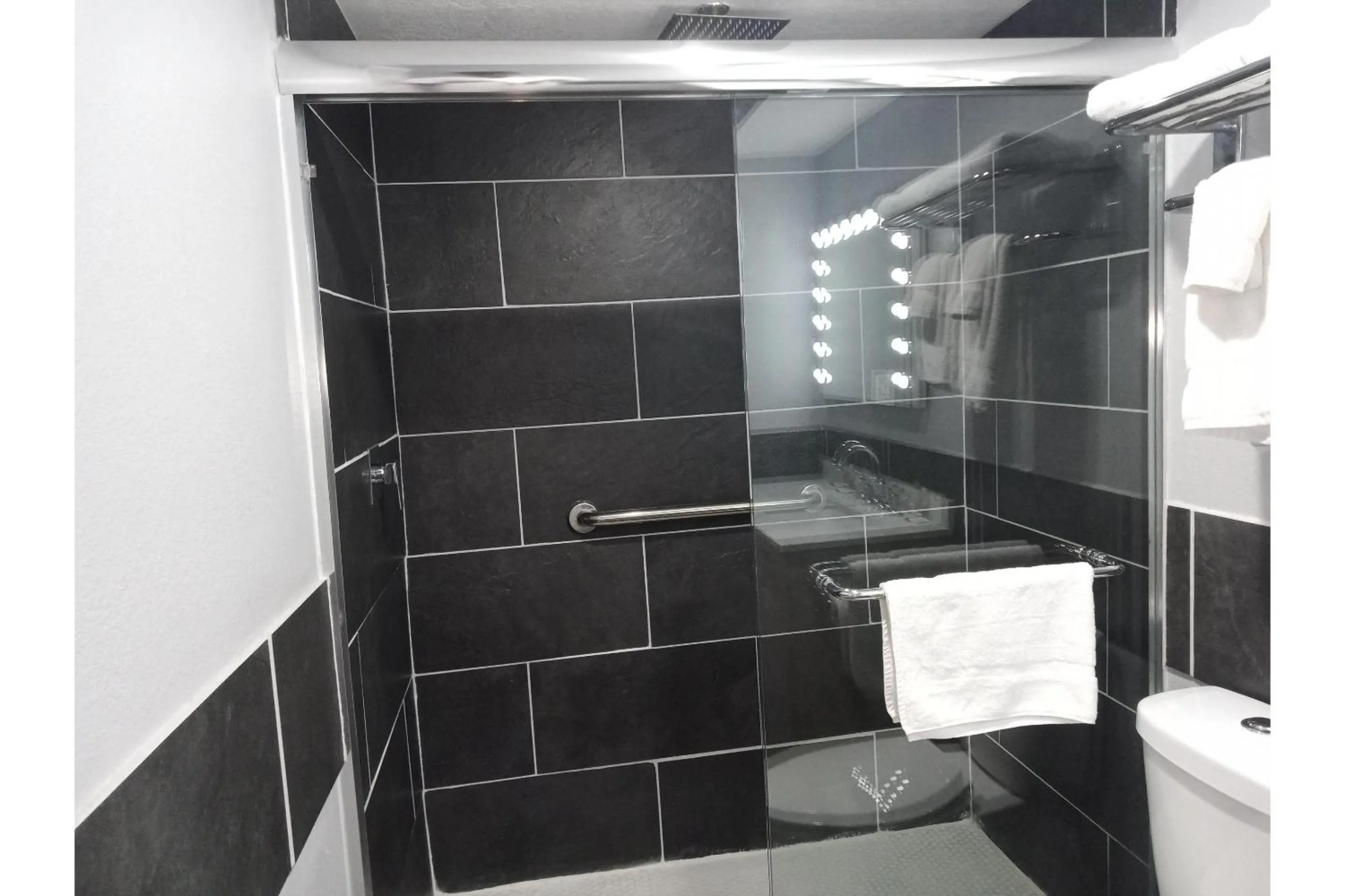 Bathroom in Marshall Lodge By OYO Hwy 65