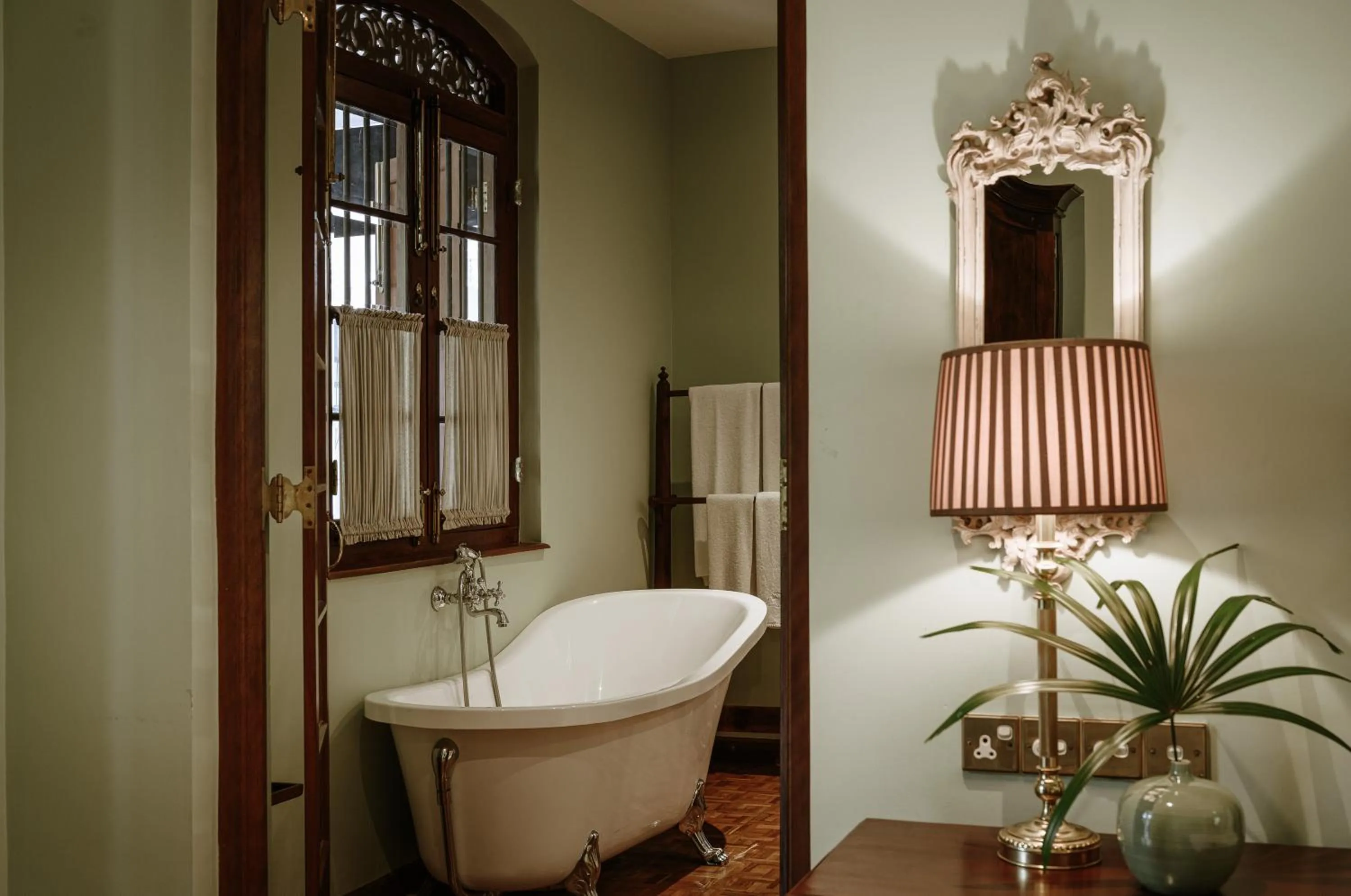 Bathroom in Maniumpathy Hotel