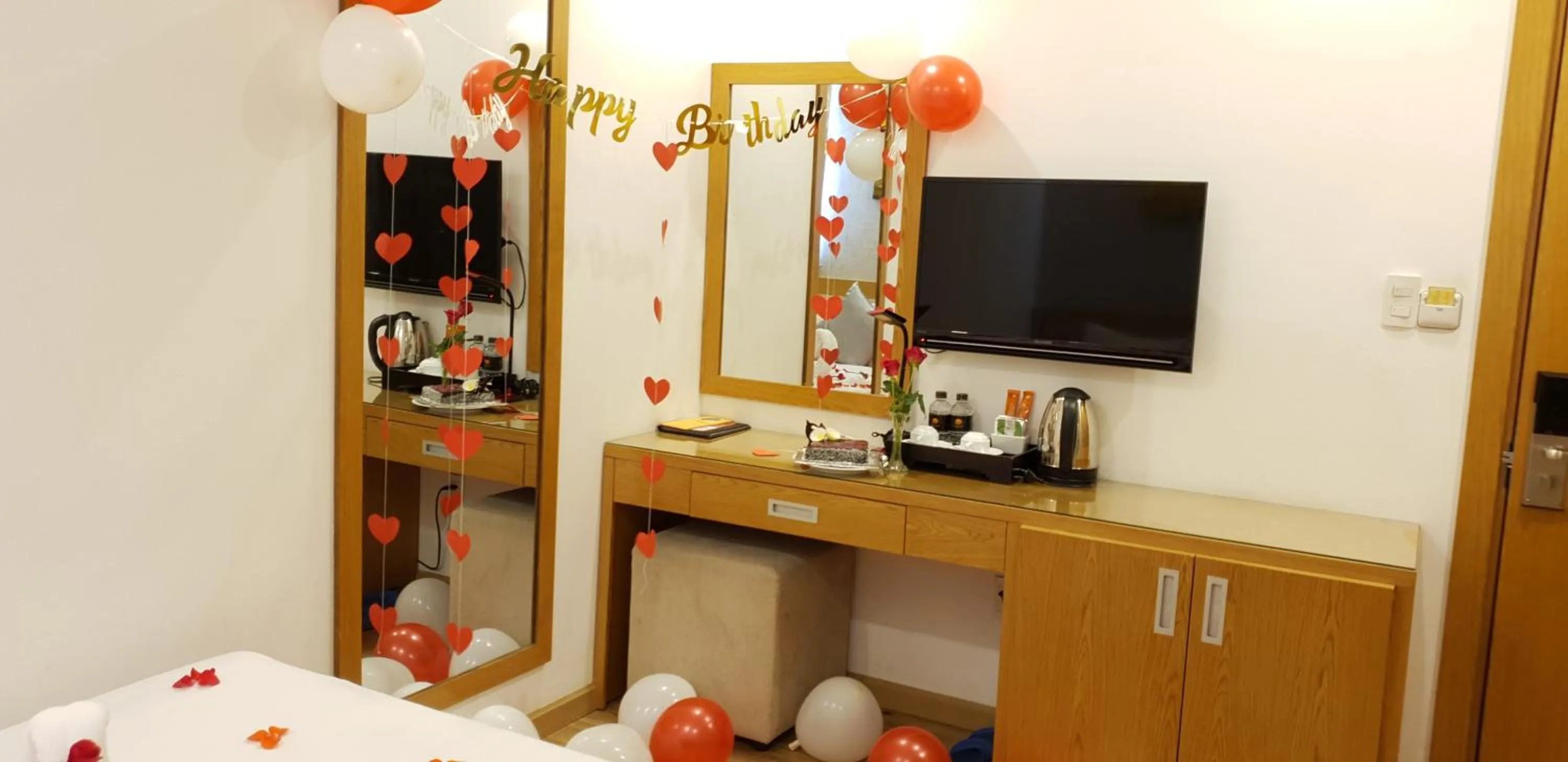 Communal lounge/ TV room, Bed in Helios Boutique Hotel & Spa