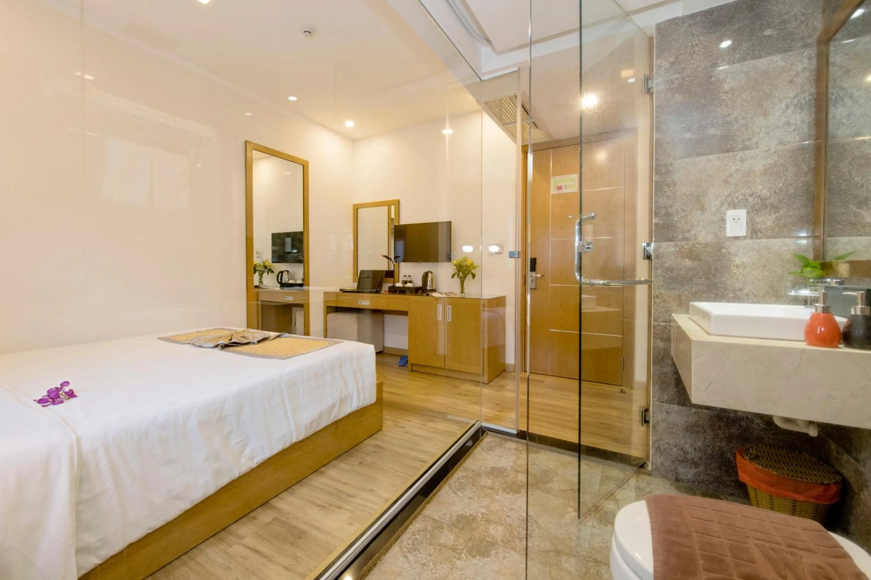 Bed in Helios Boutique Hotel & Spa