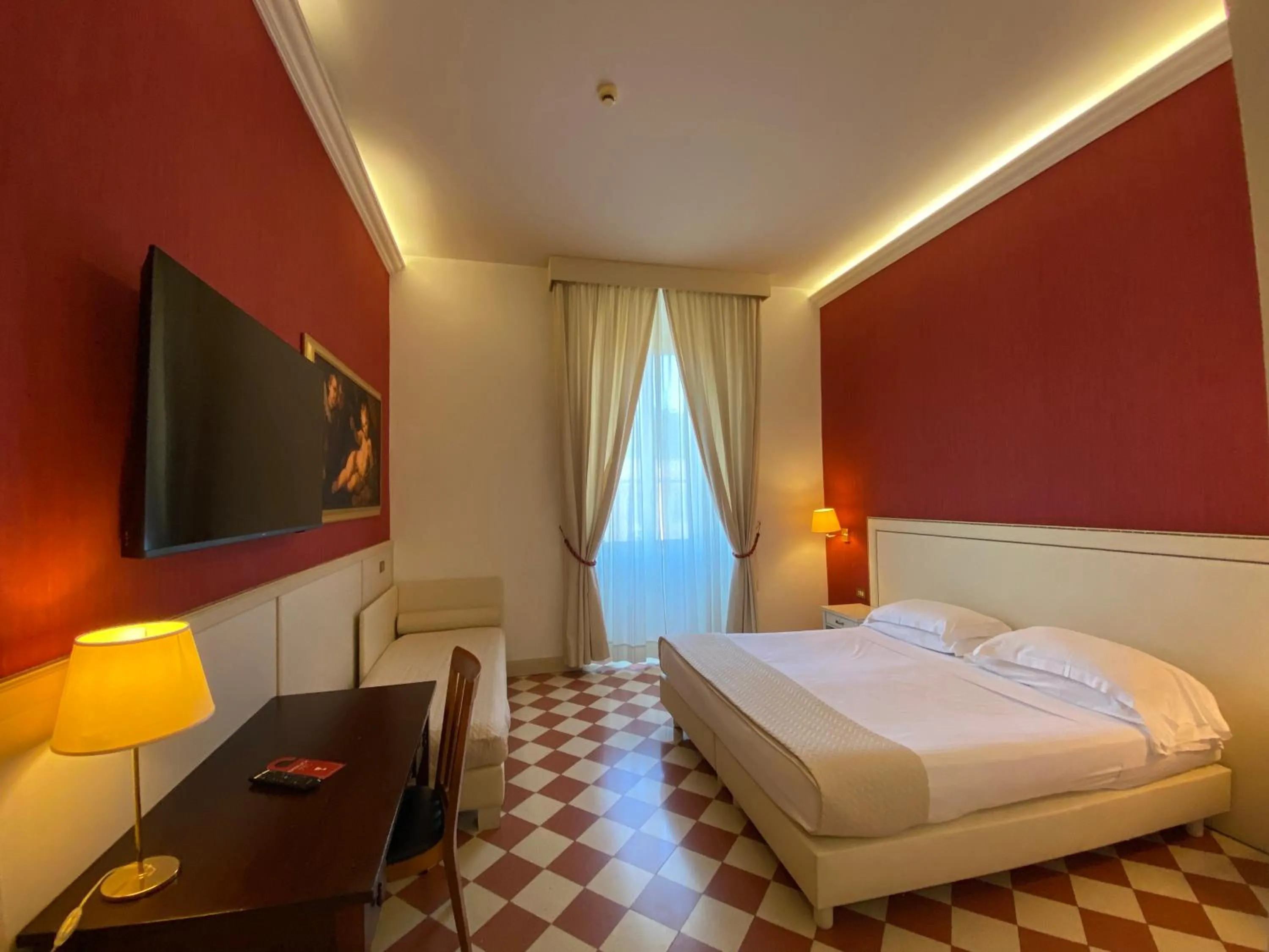 Bed in Basilica Hotel