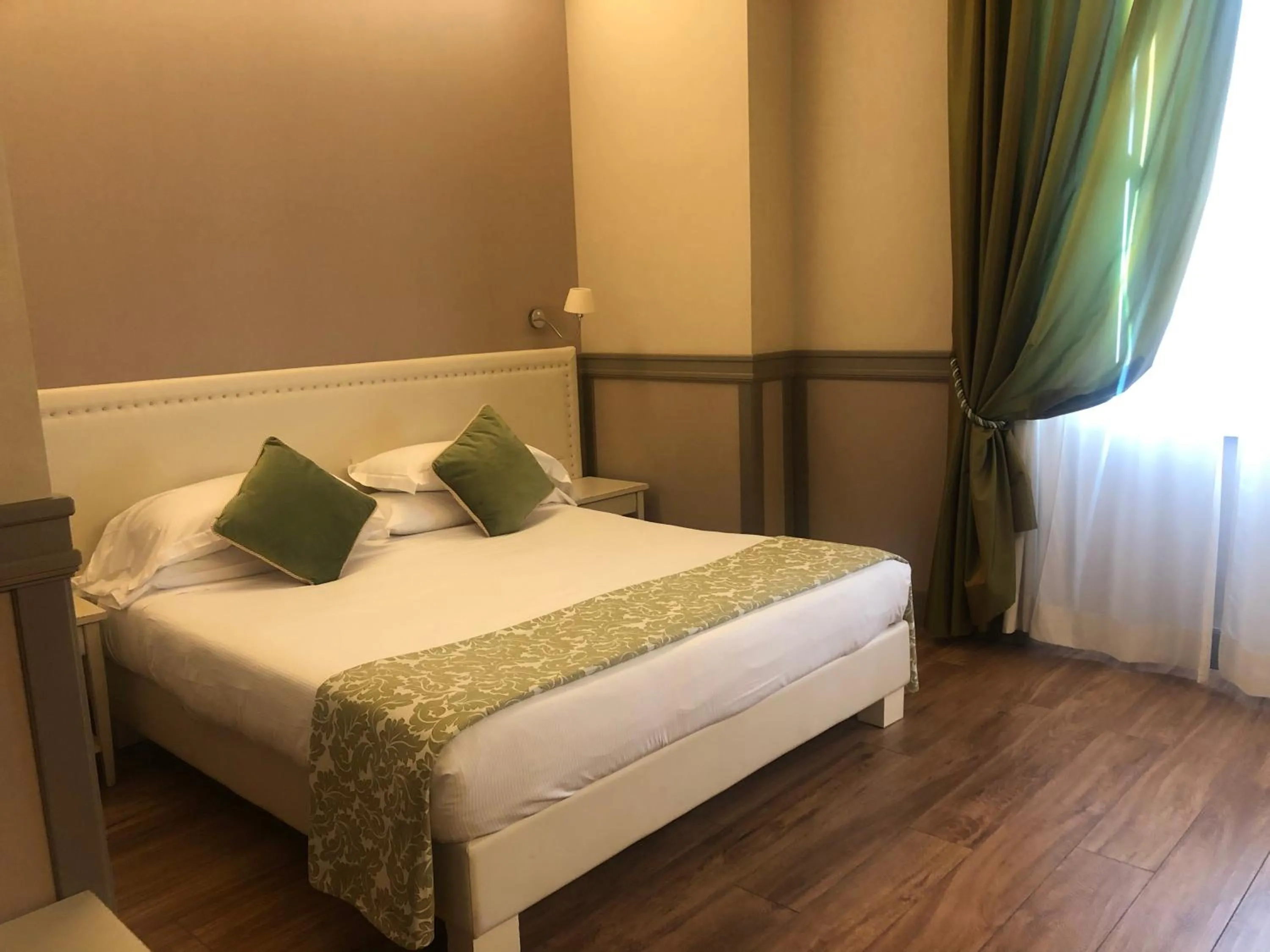 Bed in Basilica Hotel