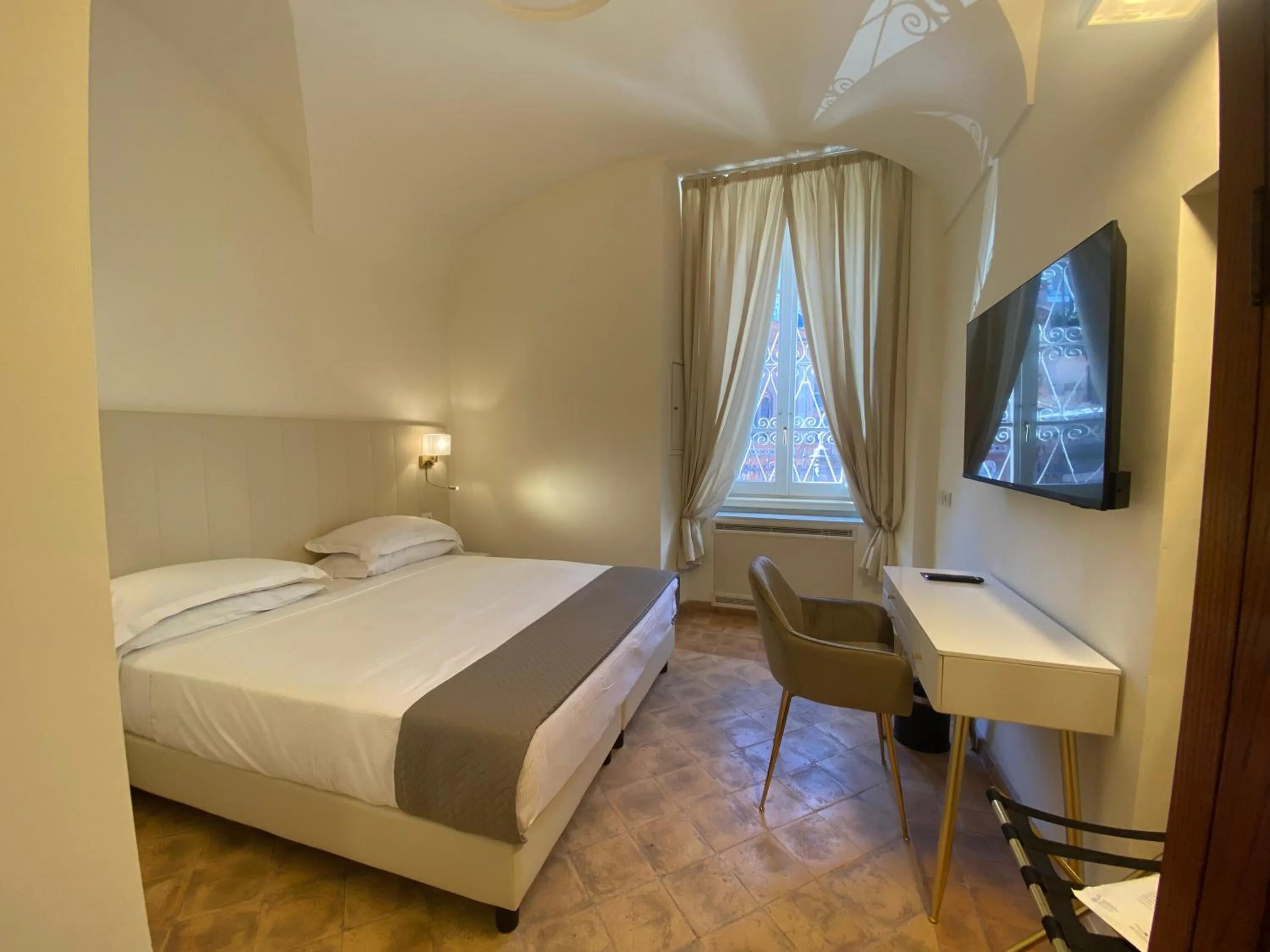 Bed in Basilica Hotel