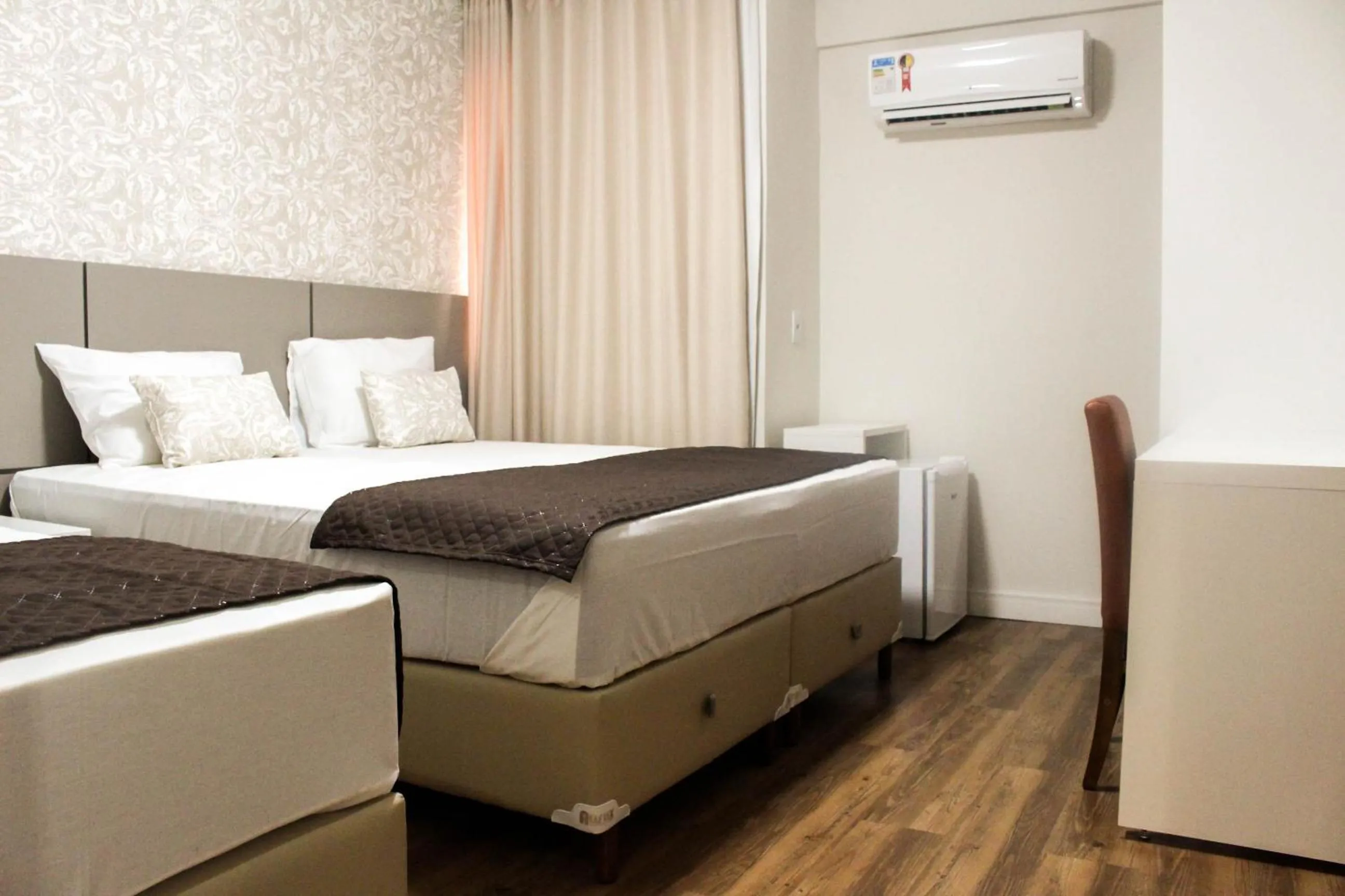 Bed in Hotel Caju de Ouro