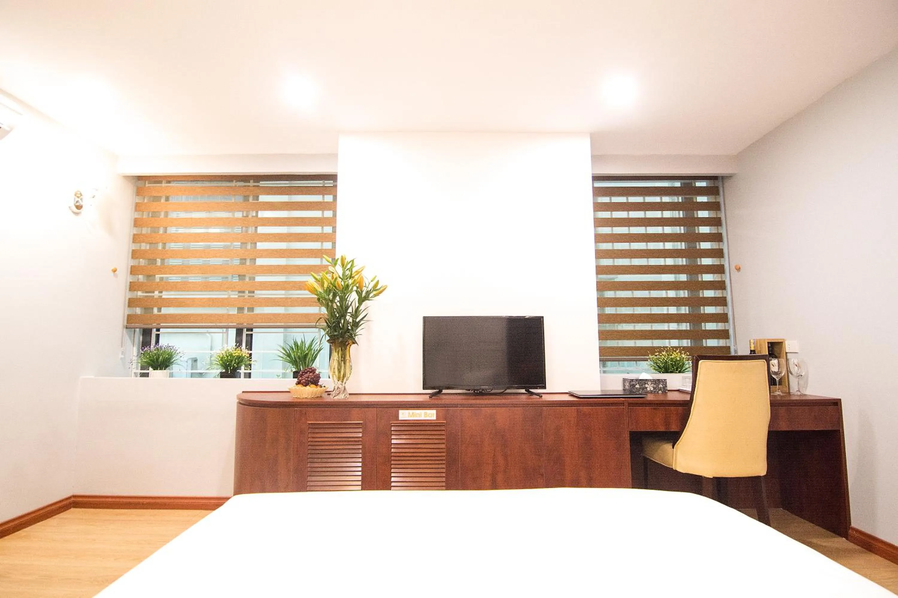 Bed in Canary Ha Noi Hotel