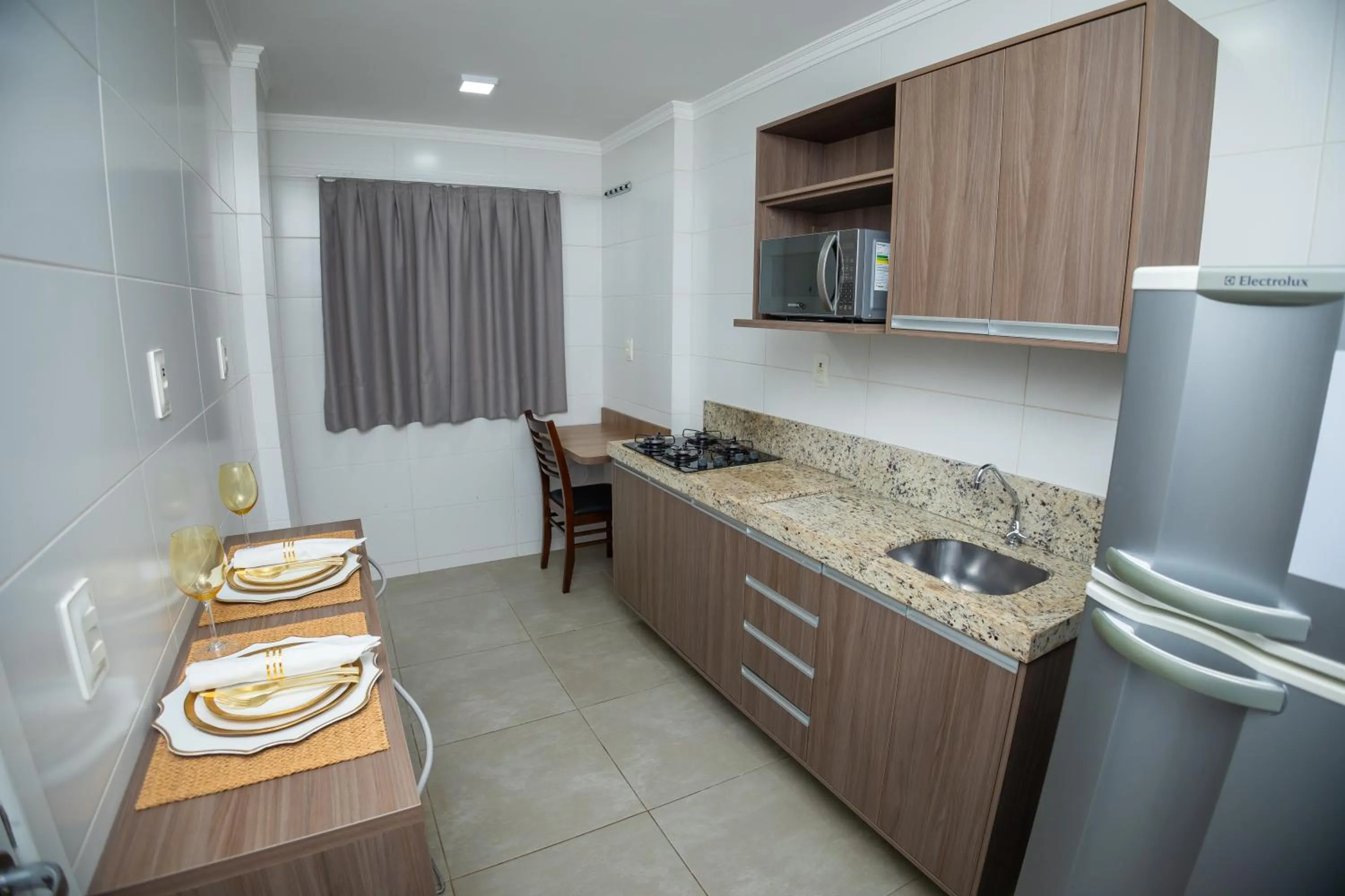 Kitchen or kitchenette in Concept Hotel Flat