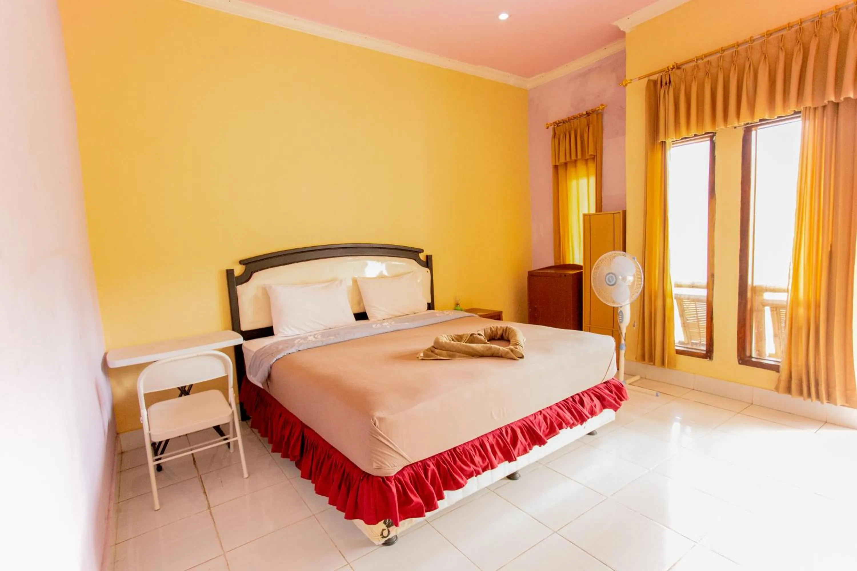 Bed in Pondok Guru Bakti Cottage