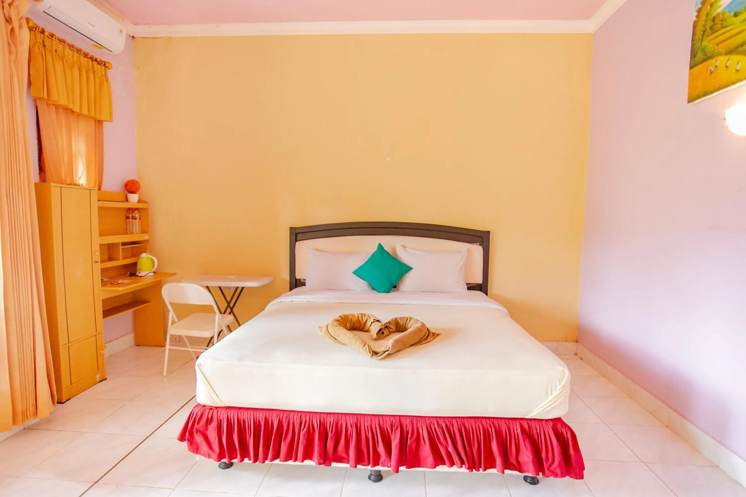 Bed in Pondok Guru Bakti Cottage