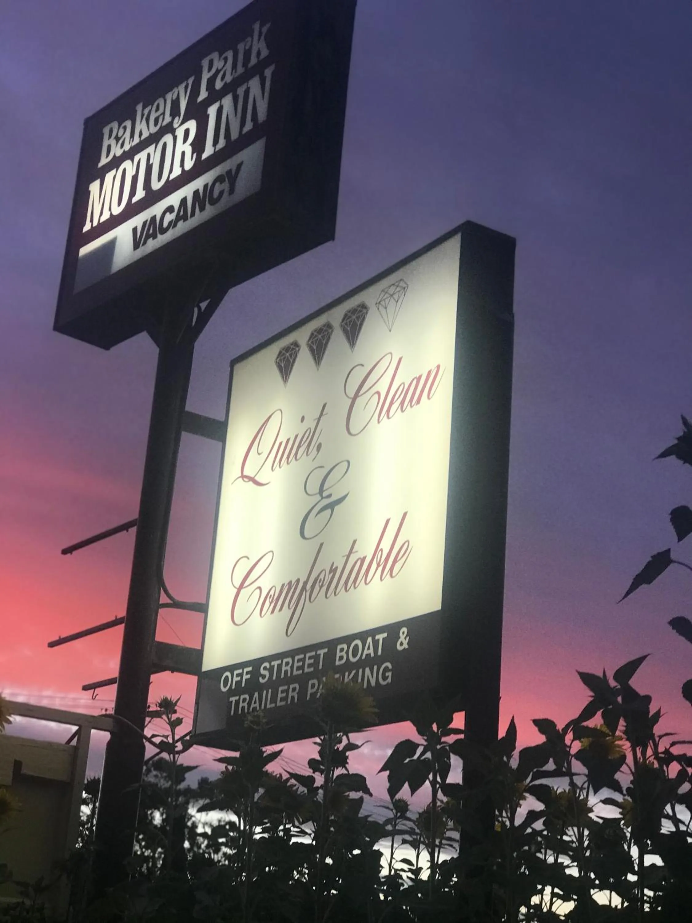 Property logo or sign in Bakery Park Motor Inn