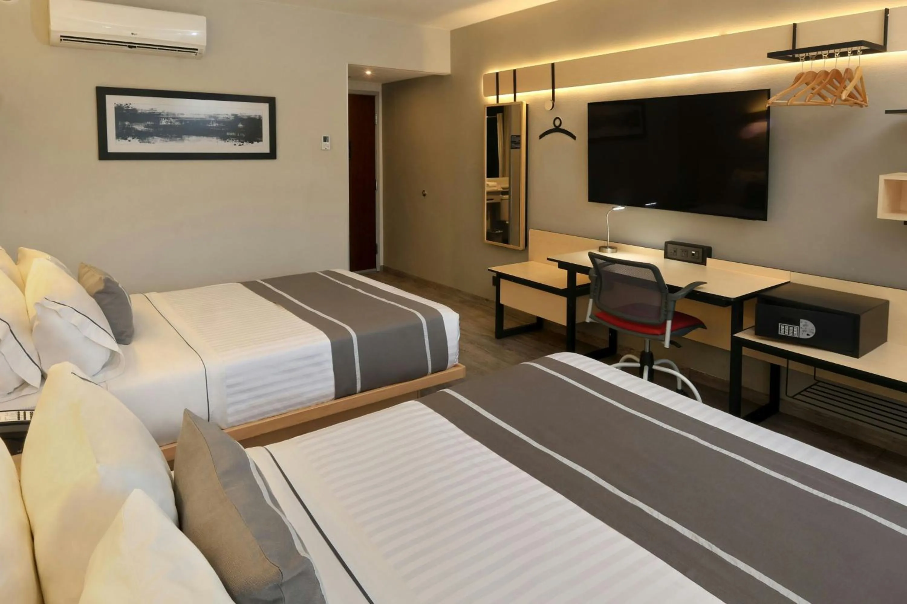 Photo of the whole room, Bed in City Express Plus by Marriott Monterrey Galerías