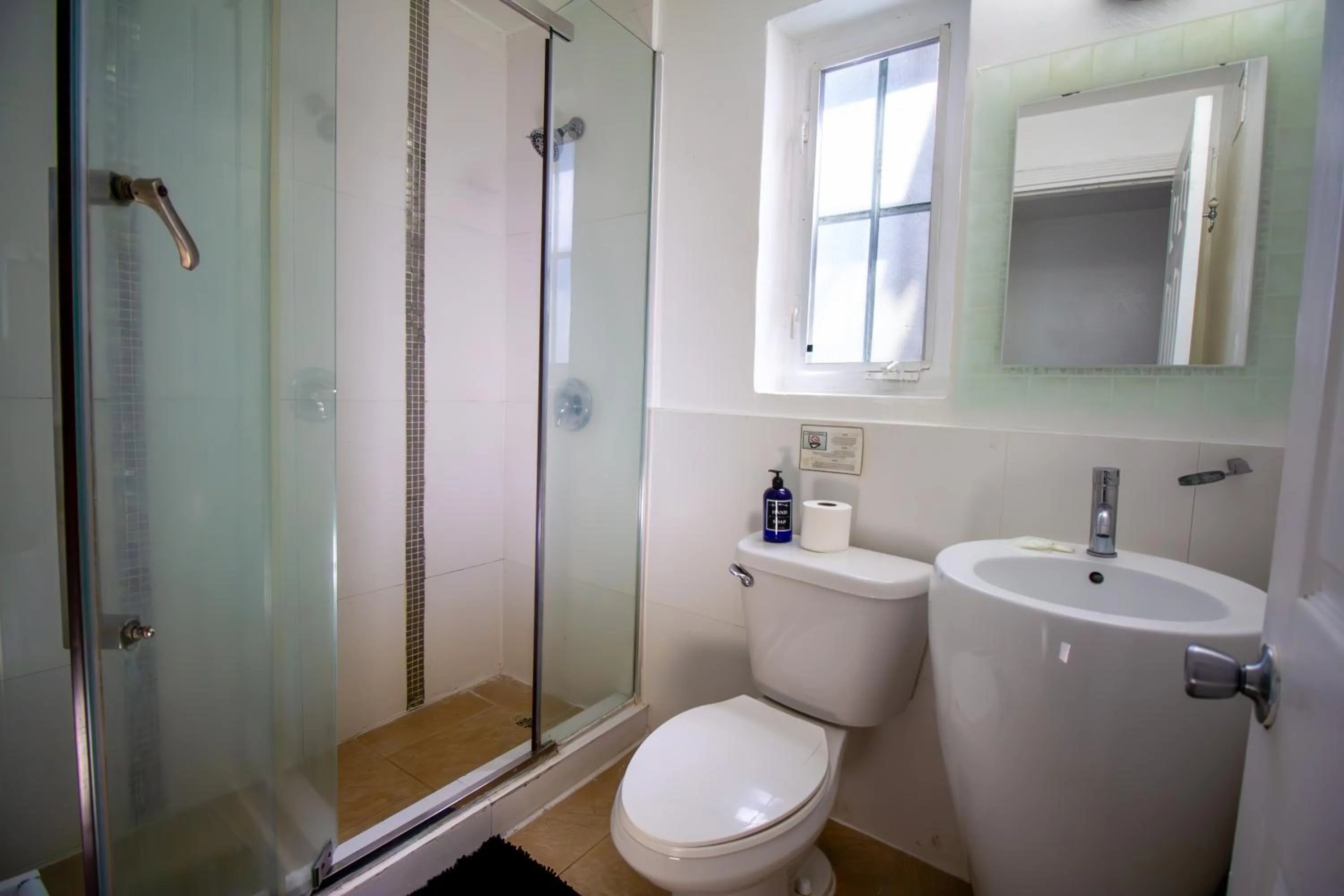 Shower in Courtyard Apartments Part of the Oasis Casita Collection
